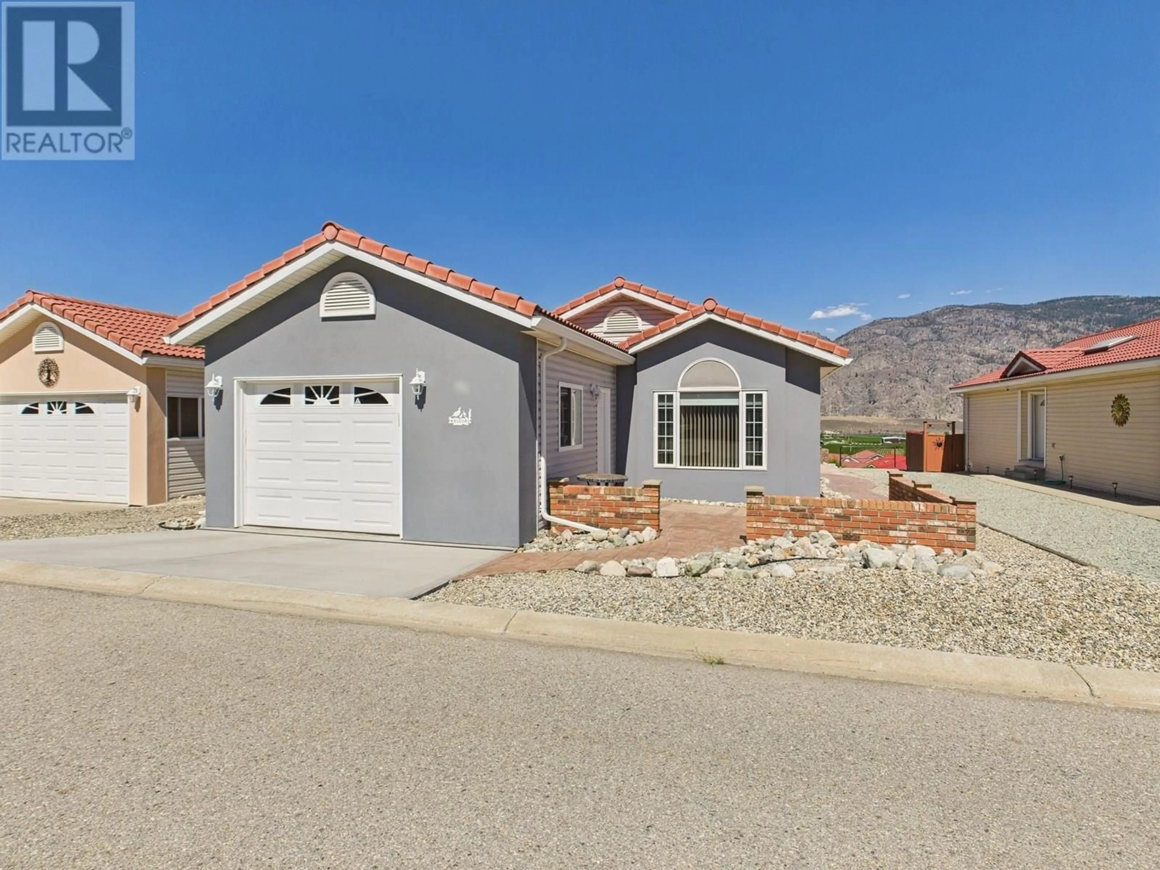 Home with vinyl exterior material, street for 45 - 9400 115TH STREET, Osoyoos British Columbia V0H1V5
