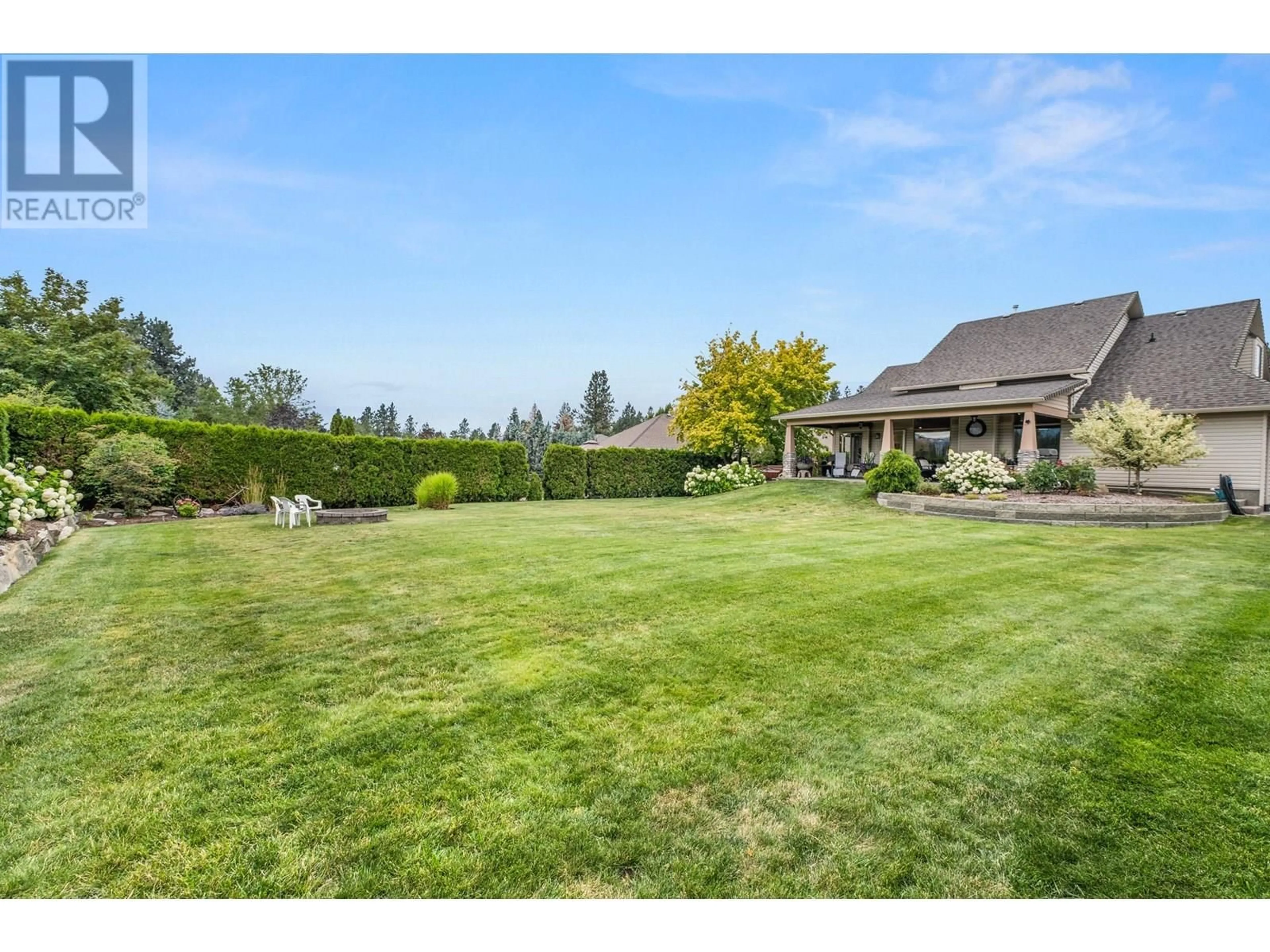 A pic from outside/outdoor area/front of a property/back of a property/a pic from drone, unknown for 3585 KIMATOUCHE ROAD, Kelowna British Columbia V1Y3G2