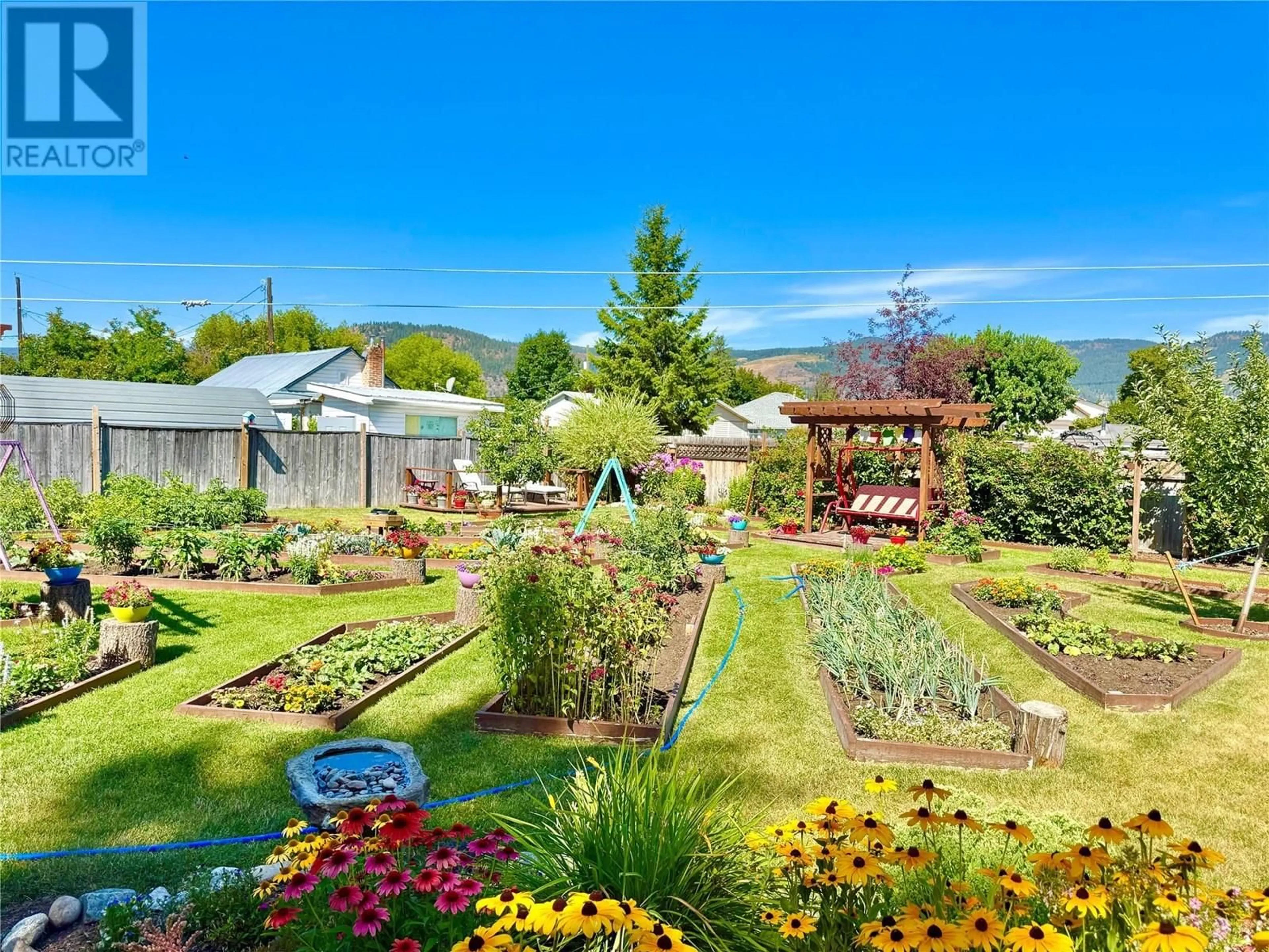 Patio, mountain view for 1543 68TH AVENUE, Grand Forks British Columbia V0H1H0