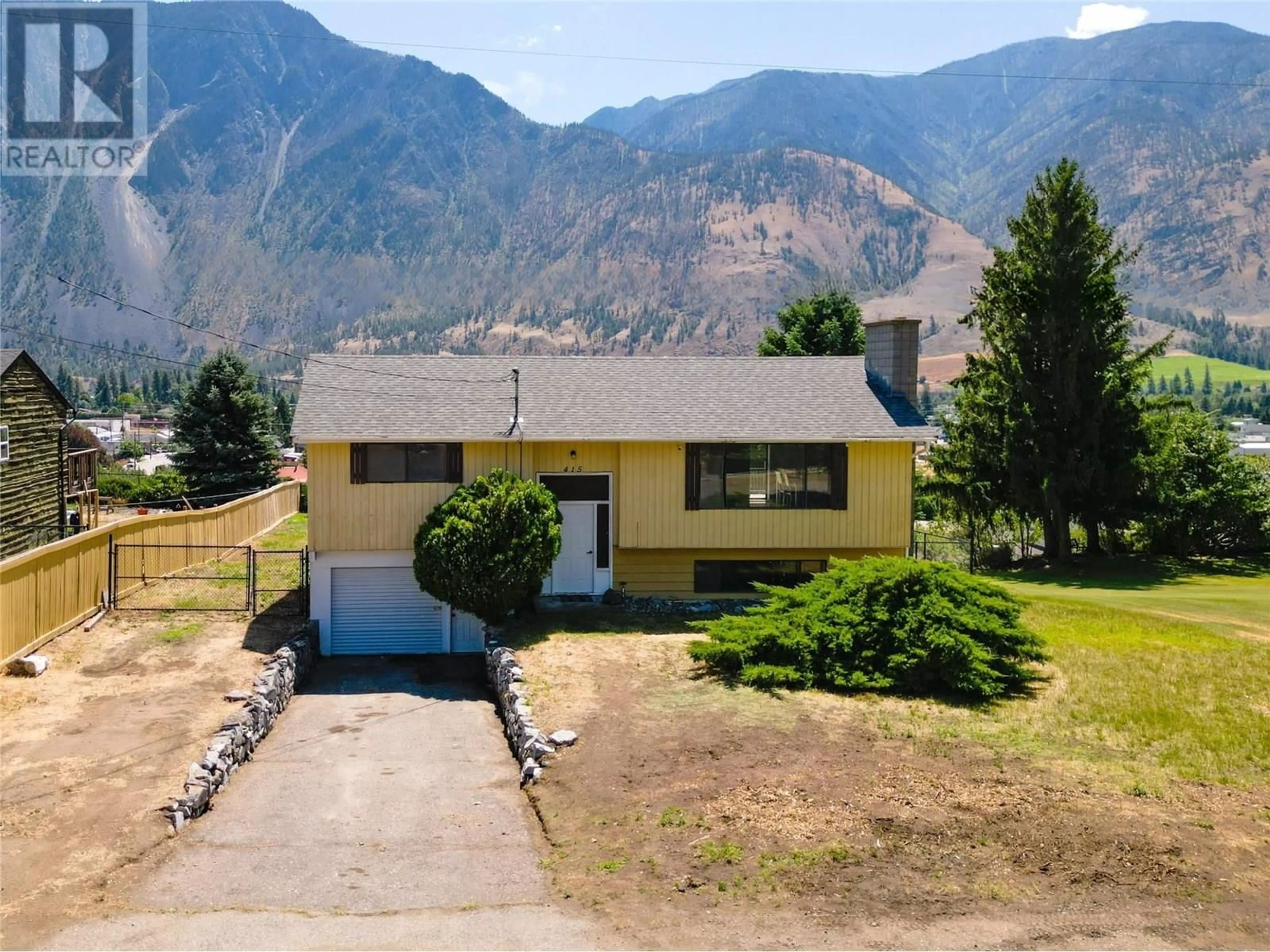A pic from outside/outdoor area/front of a property/back of a property/a pic from drone, mountain view for 415 3RD AVENUE, Keremeos British Columbia V0X1N2