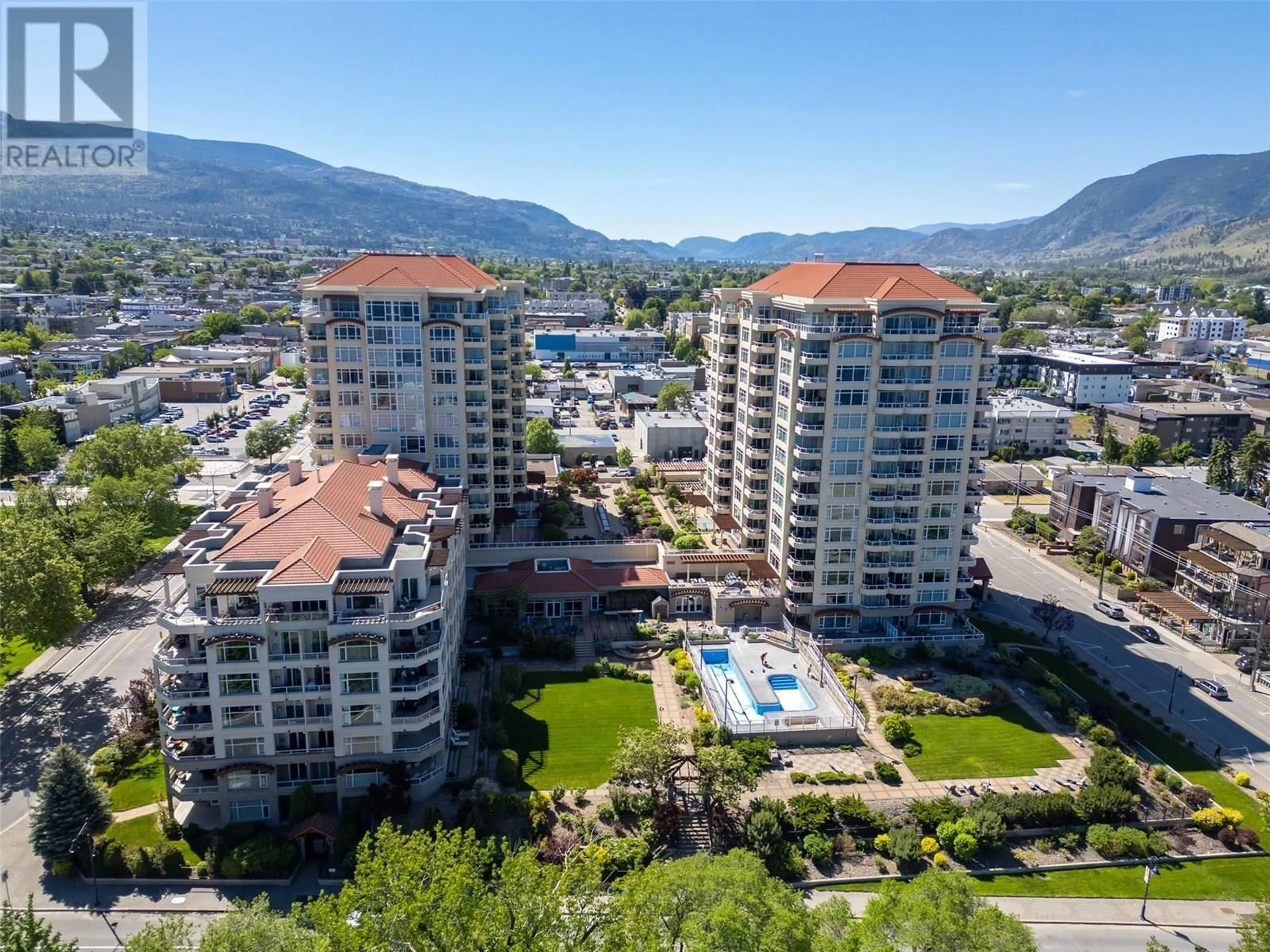 A pic from outside/outdoor area/front of a property/back of a property/a pic from drone, mountain view for 401 - 160 LAKESHORE DRIVE WEST, Penticton British Columbia V2A9C2