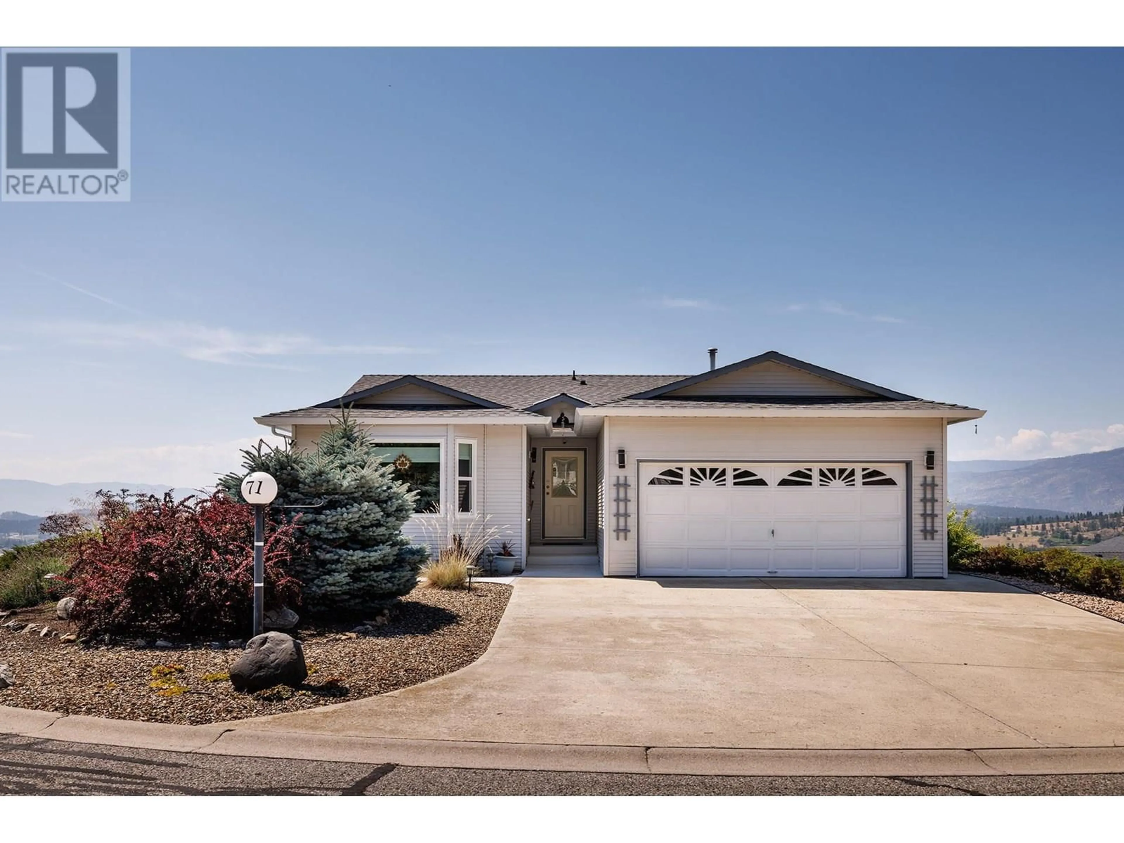 Home with vinyl exterior material, street for 71 - 6400 SPENCER ROAD, Ellison British Columbia V1X7T6