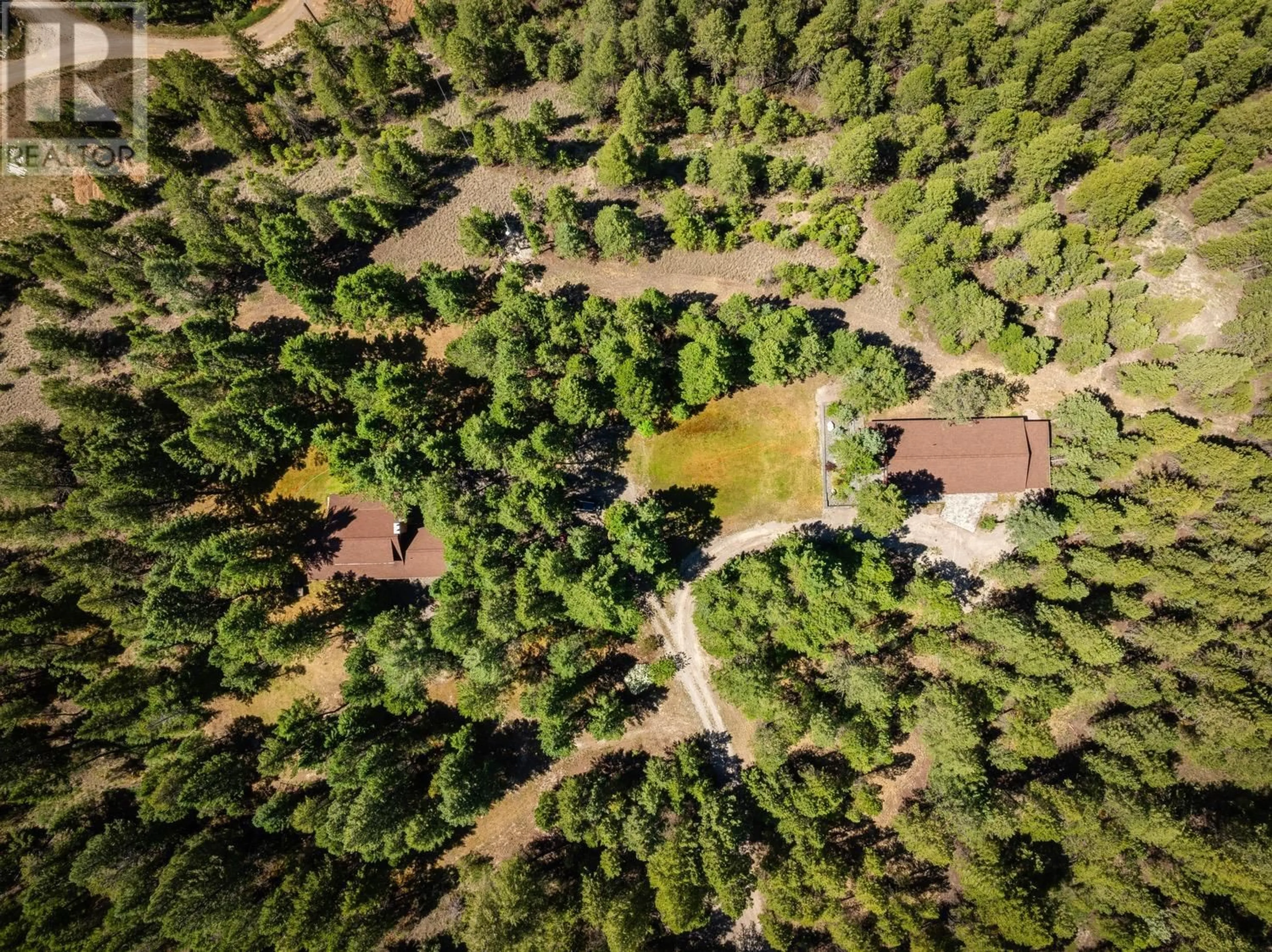 A pic from outside/outdoor area/front of a property/back of a property/a pic from drone, forest/trees view for 8566 EACRETT ROAD, Dry Gulch British Columbia V0A1K2