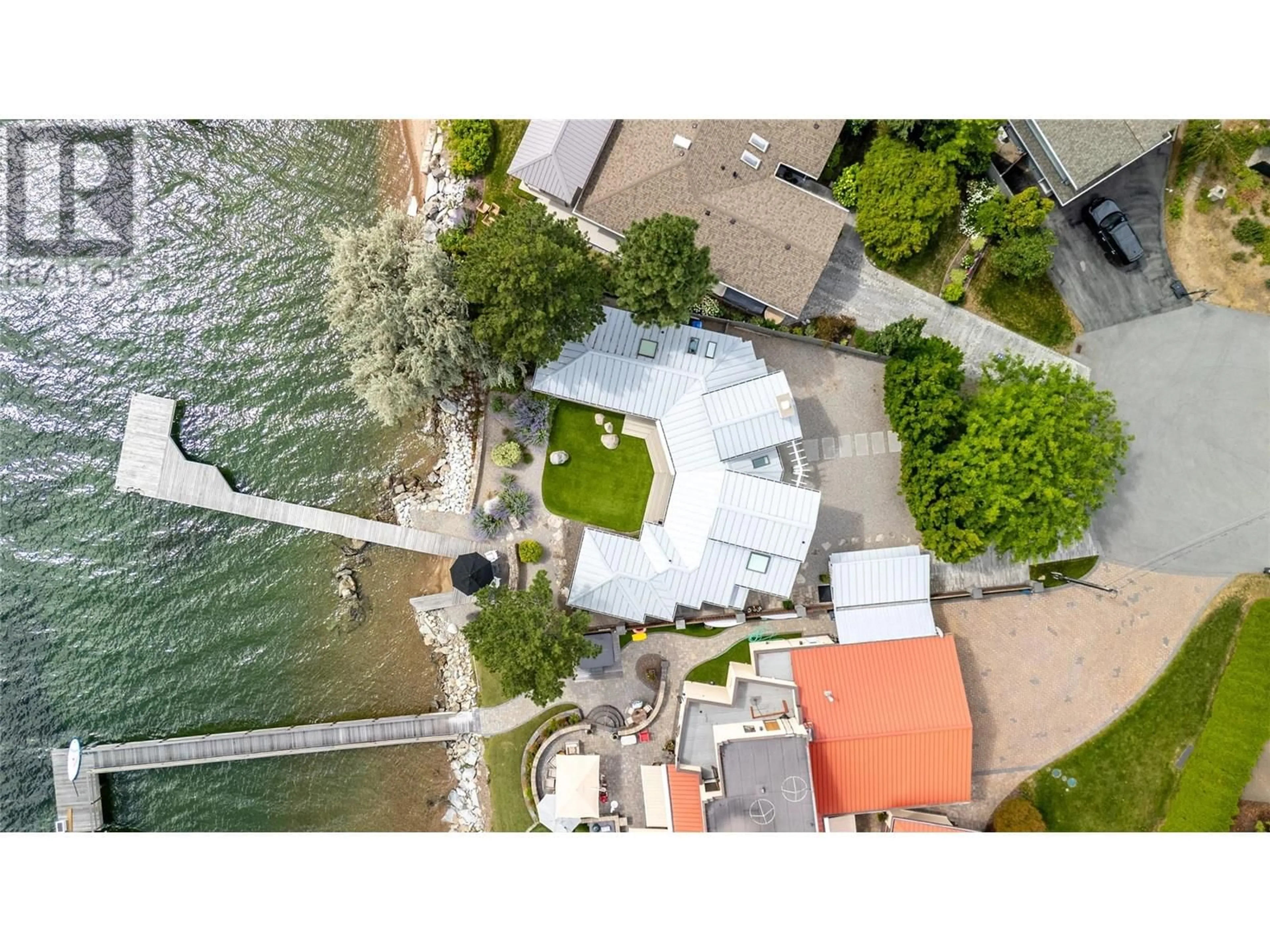 A pic from outside/outdoor area/front of a property/back of a property/a pic from drone, water/lake/river/ocean view for 40 ROBINSON POINT ROAD, Naramata British Columbia V0H1N1