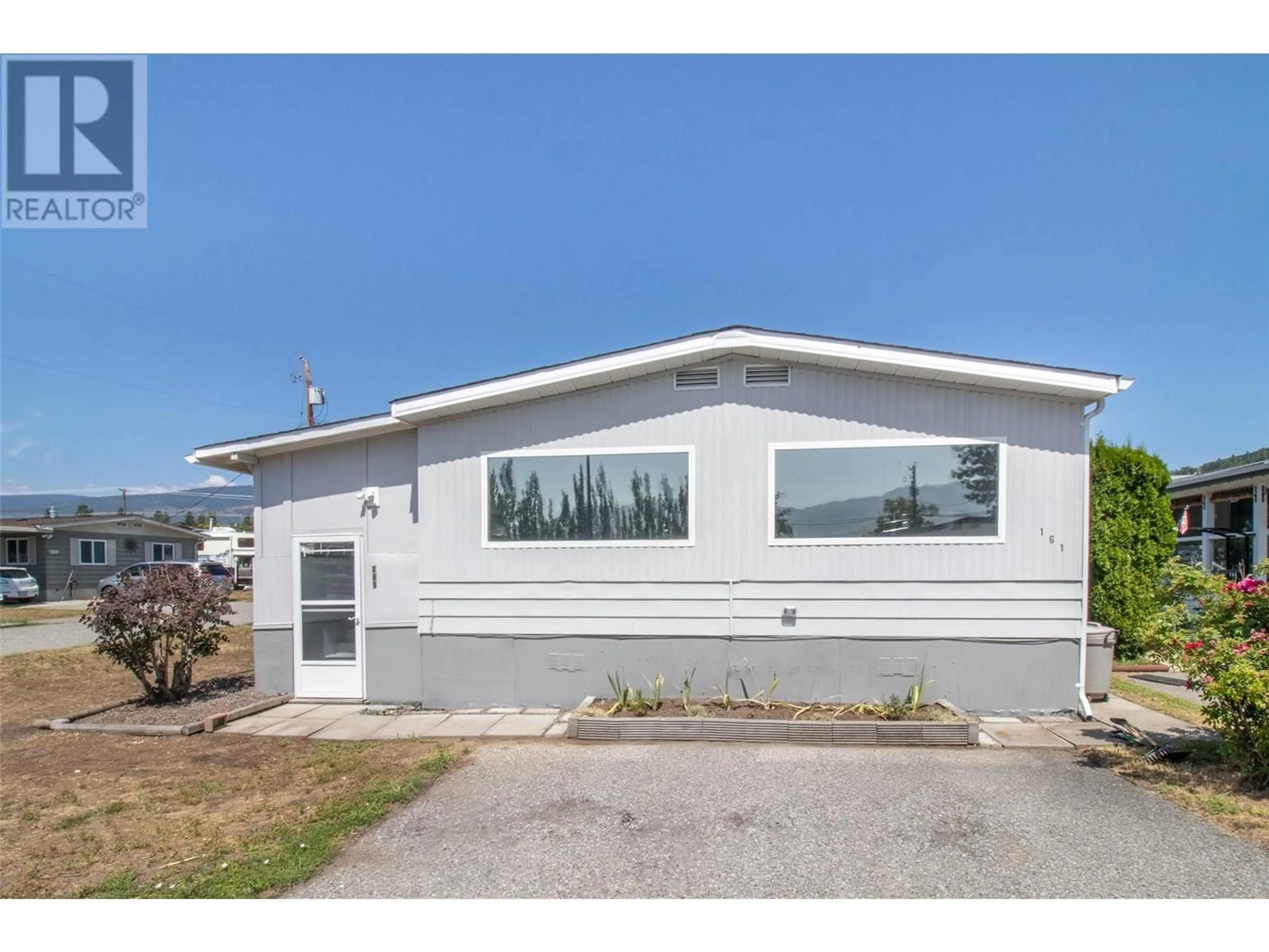 Home with vinyl exterior material, building for 161 - 1880 OLD BOUCHERIE ROAD, West Kelowna British Columbia V4T1Z3