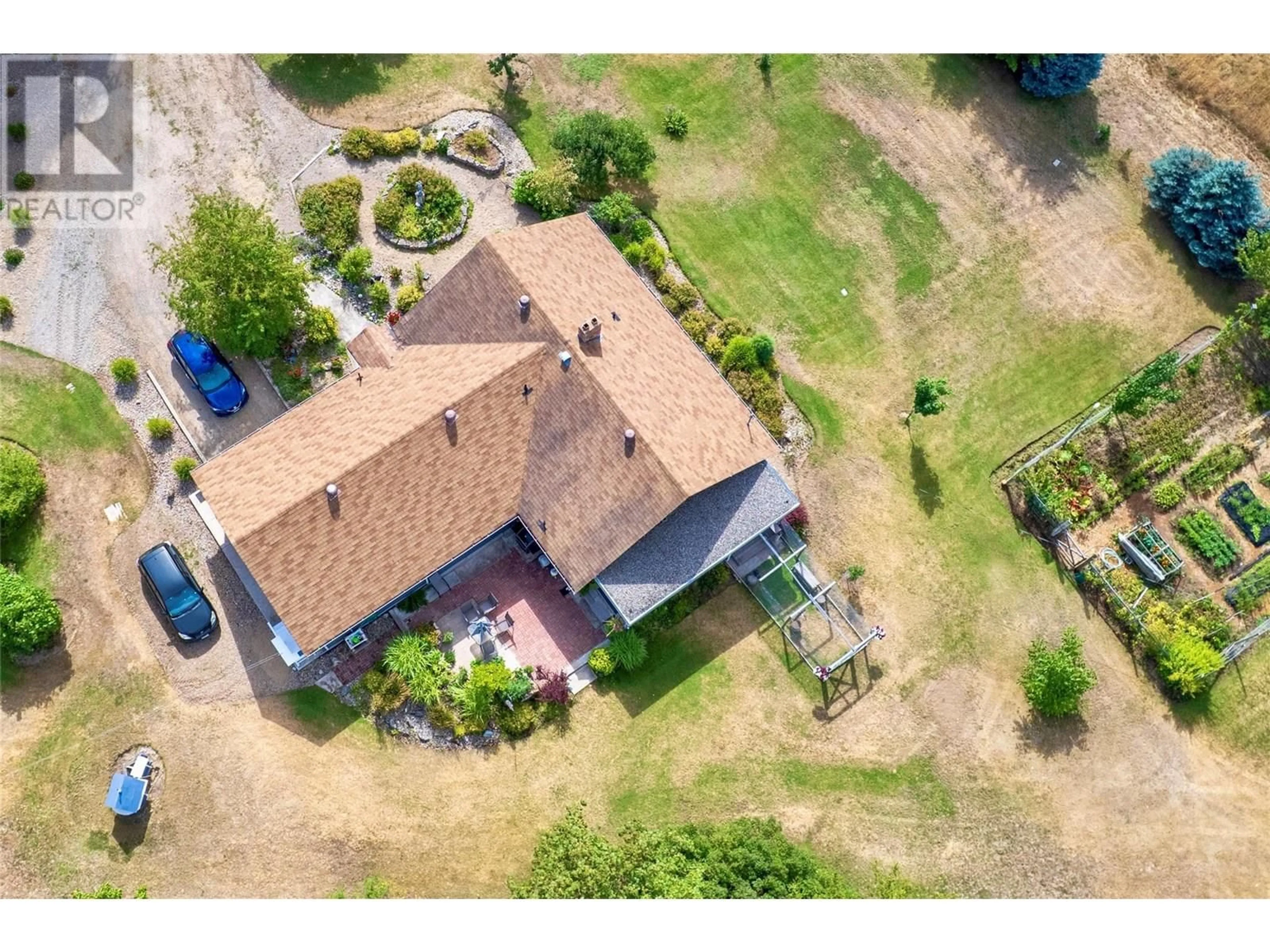 A pic from outside/outdoor area/front of a property/back of a property/a pic from drone, street for 623 GILPIN ROAD, Grand Forks British Columbia V0H1H9
