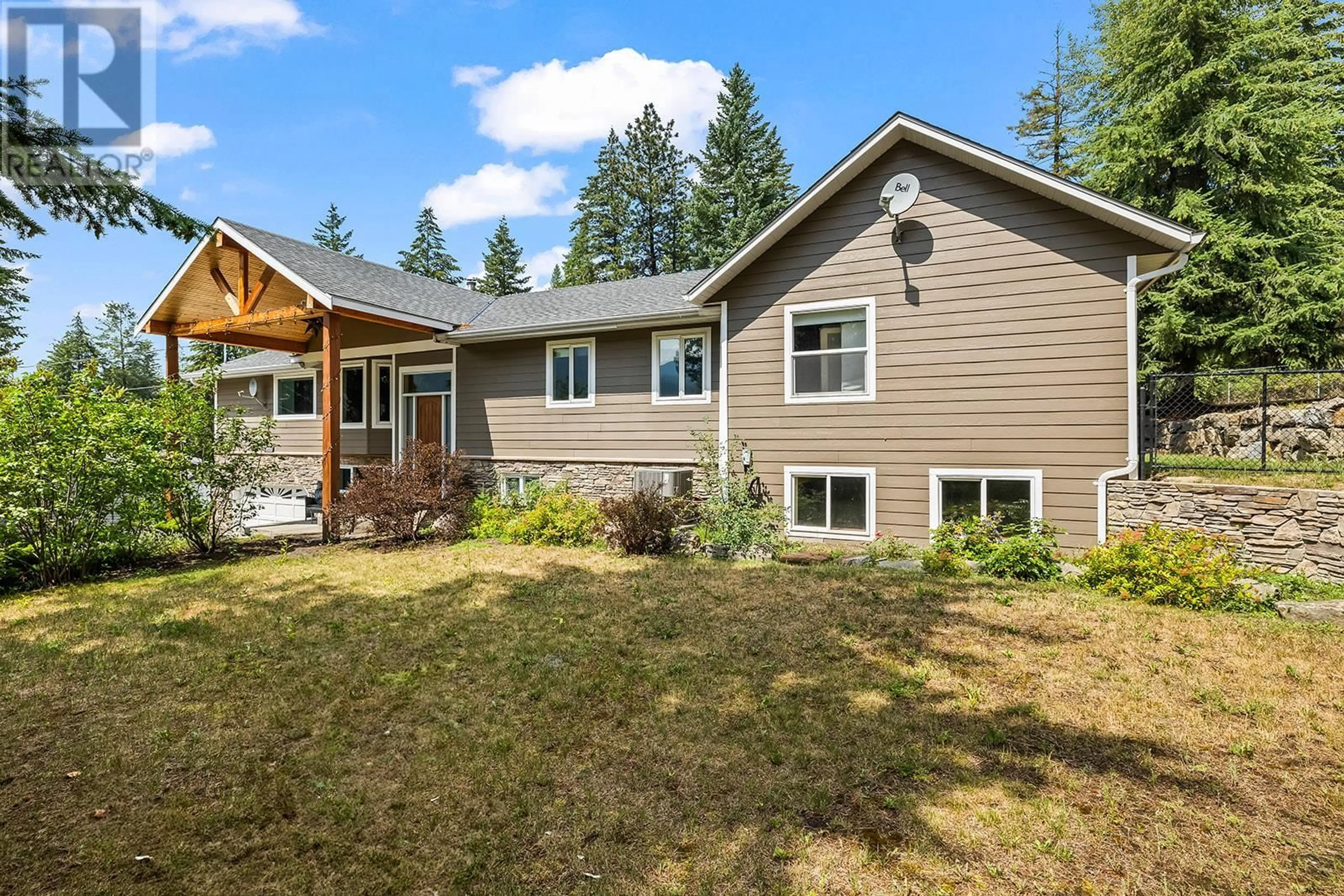 Home with vinyl exterior material, unknown for 7992 FALCON RIDGE CRESCENT, Kelowna British Columbia V1P1J2