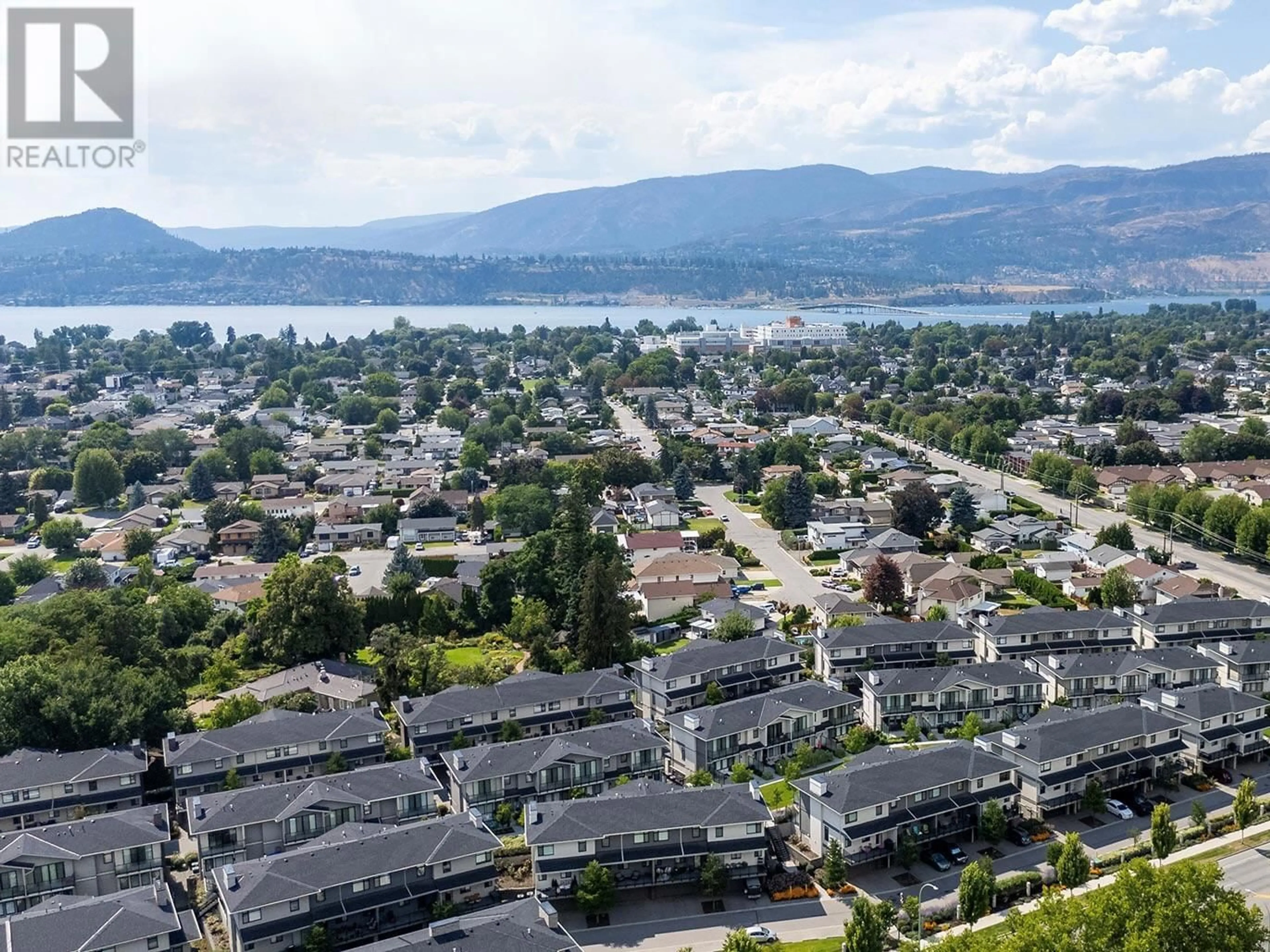 A pic from outside/outdoor area/front of a property/back of a property/a pic from drone, mountain view for 14 - 1102 CAMERON AVENUE, Kelowna British Columbia V1Y0B2