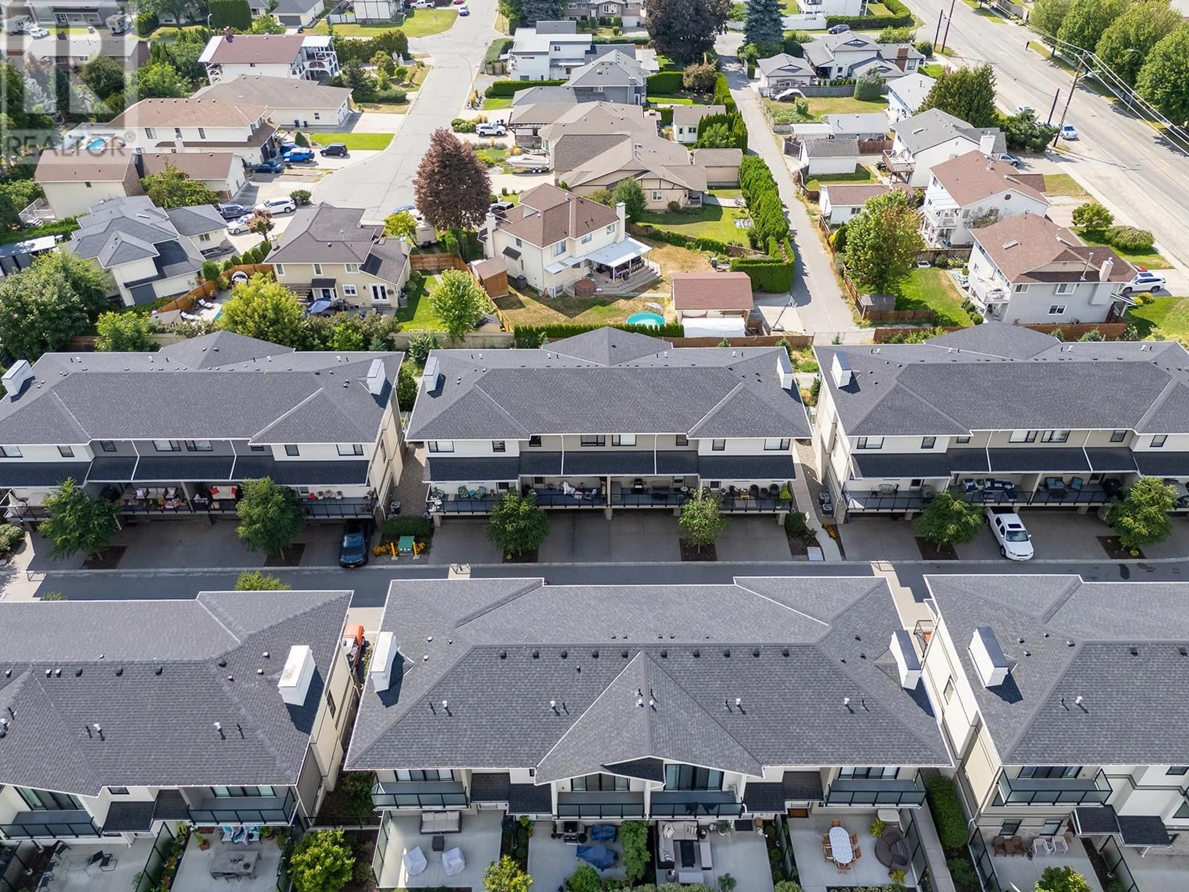 A pic from outside/outdoor area/front of a property/back of a property/a pic from drone, street for 14 - 1102 CAMERON AVENUE, Kelowna British Columbia V1Y0B2