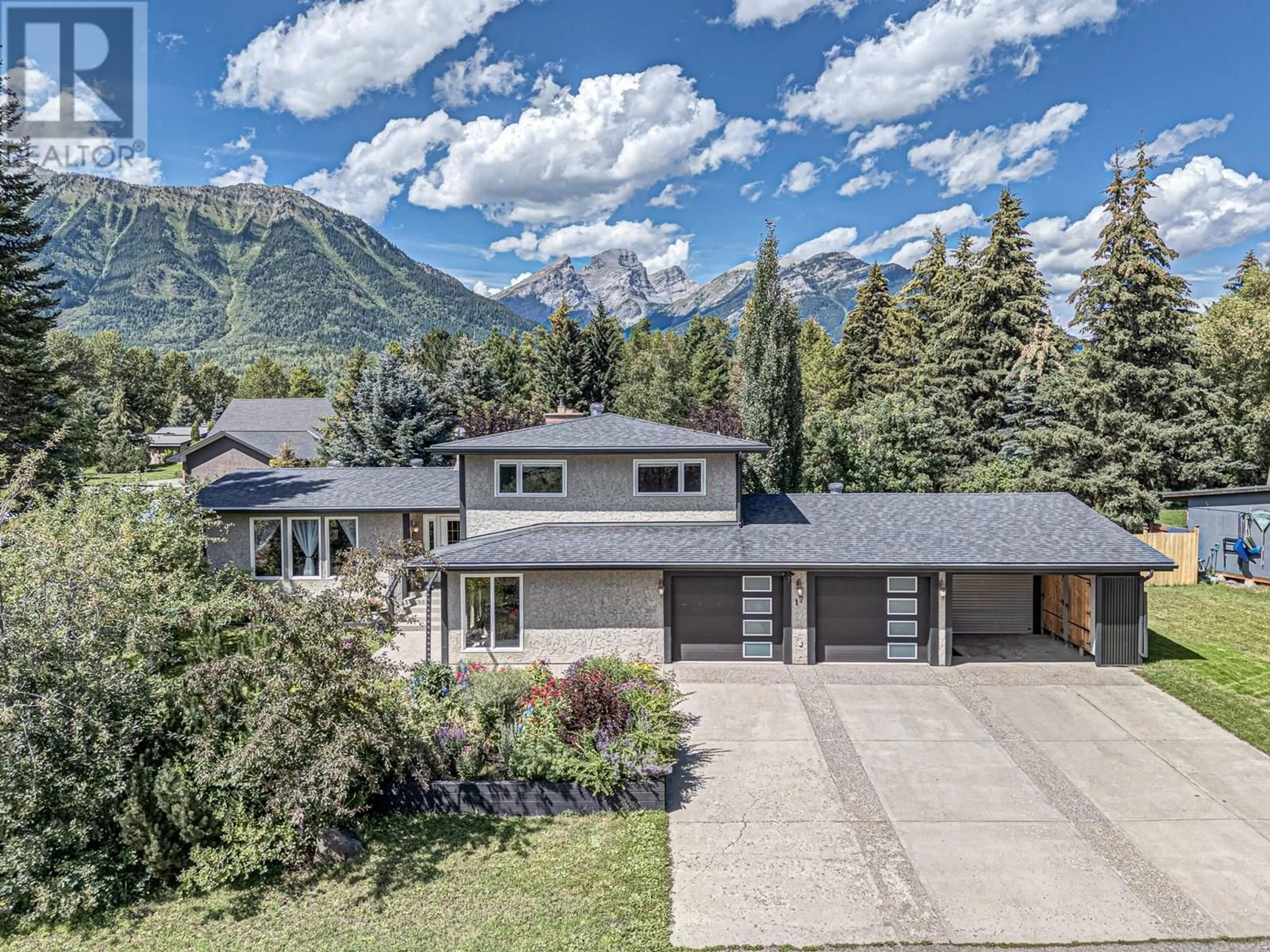 A pic from outside/outdoor area/front of a property/back of a property/a pic from drone, mountain view for 17 PINE CRESCENT, Fernie British Columbia V0B1M2