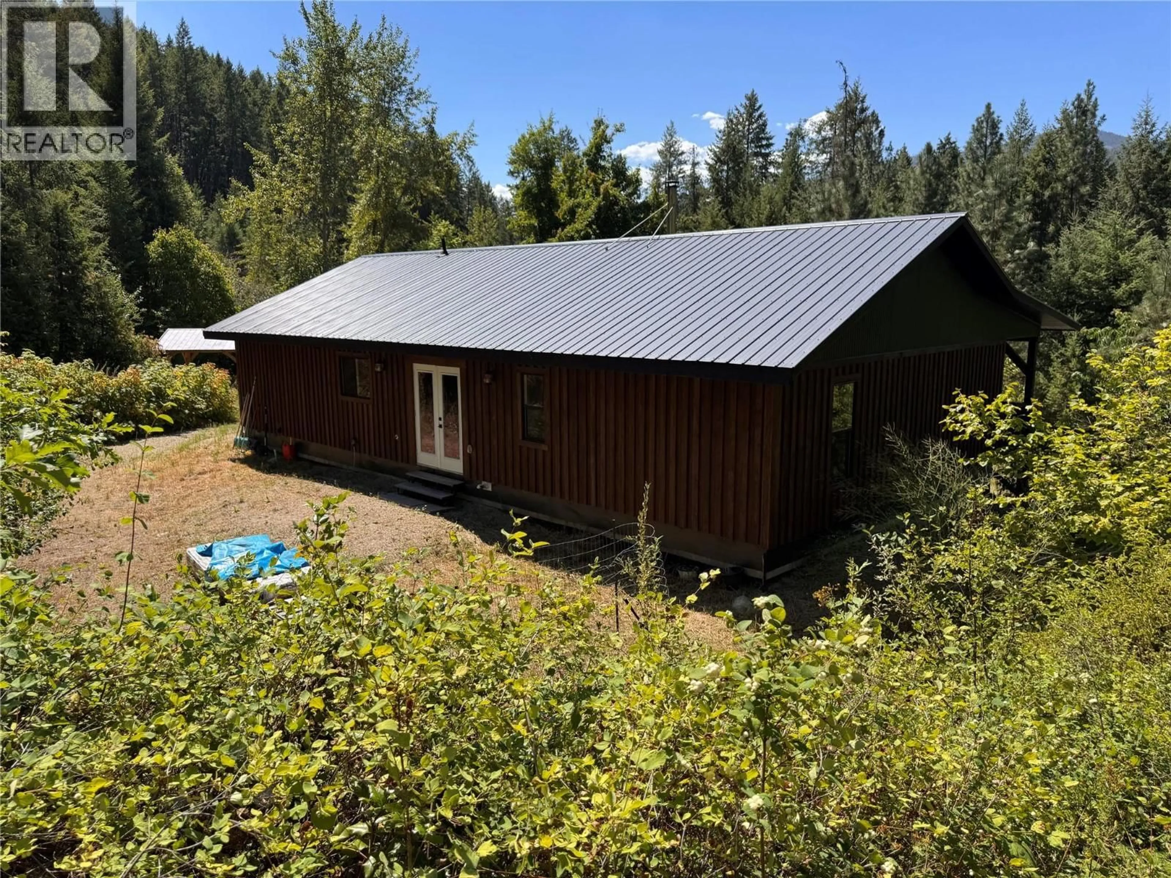 A pic from outside/outdoor area/front of a property/back of a property/a pic from drone, building for 2160 3 HIGHWAY, Christina Lake British Columbia V0H1E3