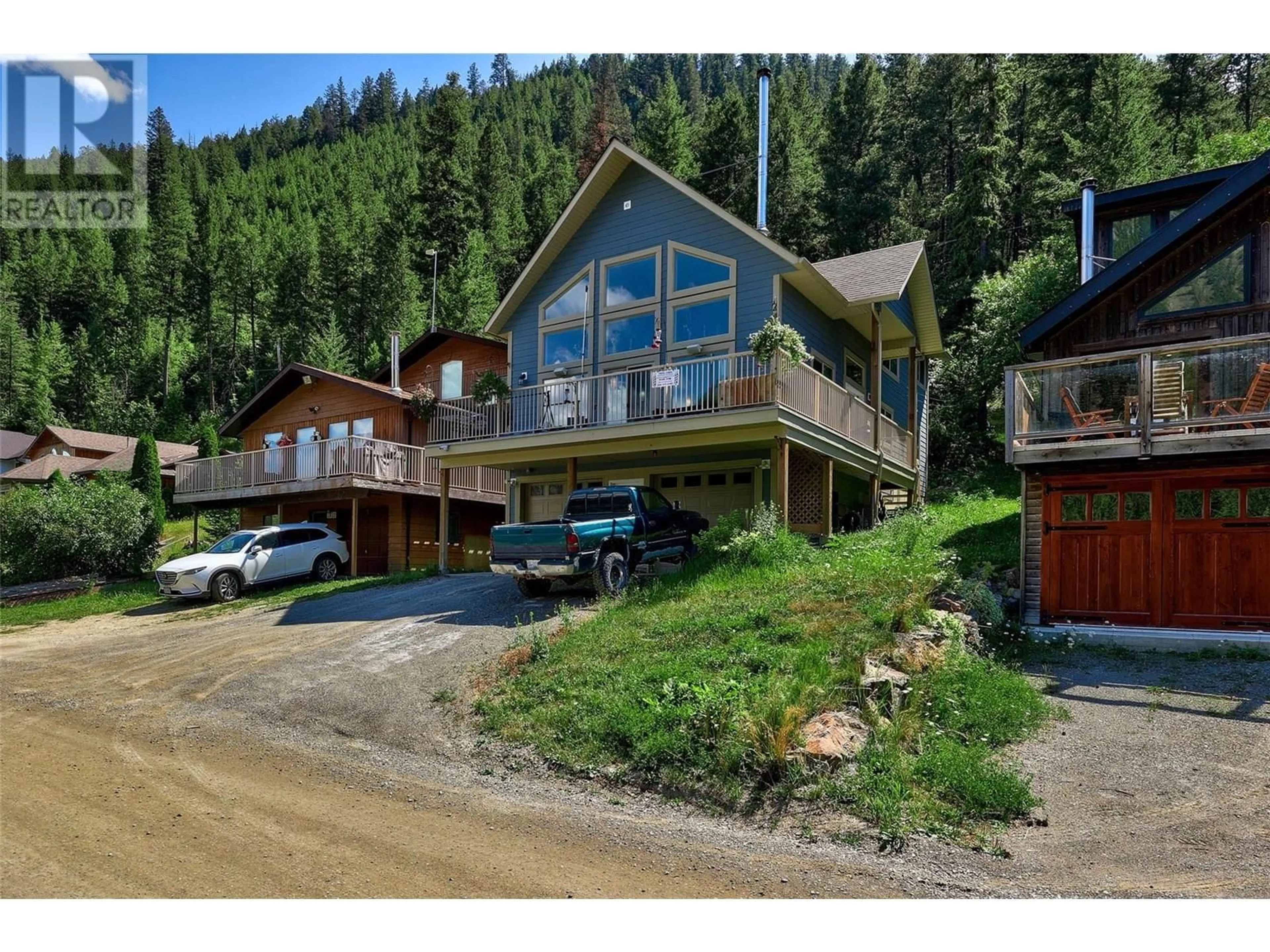 A pic from outside/outdoor area/front of a property/back of a property/a pic from drone, mountain view for 1848 PAUL LAKE ROAD, Kamloops British Columbia V2H1N8