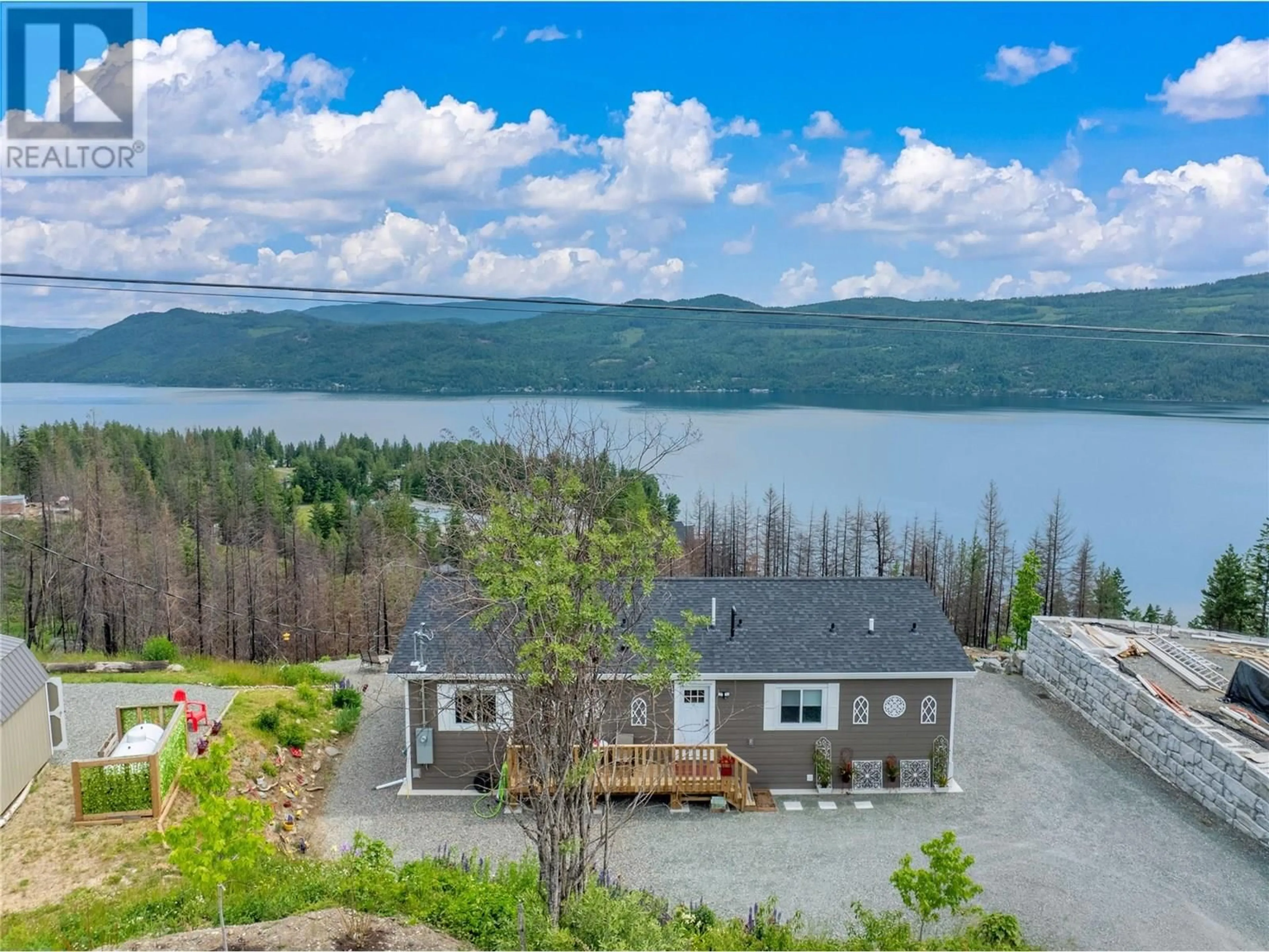 A pic from outside/outdoor area/front of a property/back of a property/a pic from drone, water/lake/river/ocean view for 5208 CELISTA PLACE, Celista British Columbia V0E1M6