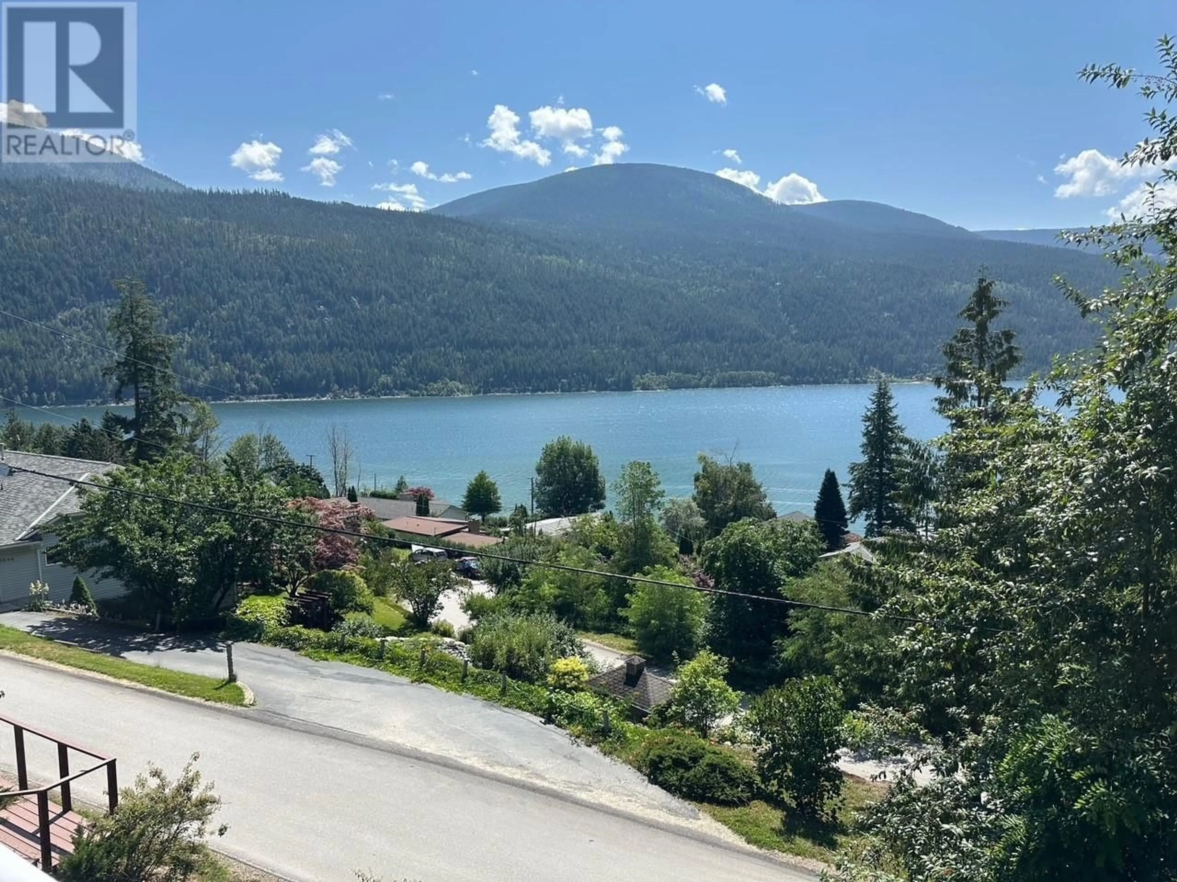 A pic from outside/outdoor area/front of a property/back of a property/a pic from drone, water/lake/river/ocean view for 1551 NASOOKIN ROAD, Nelson British Columbia V1L6J6