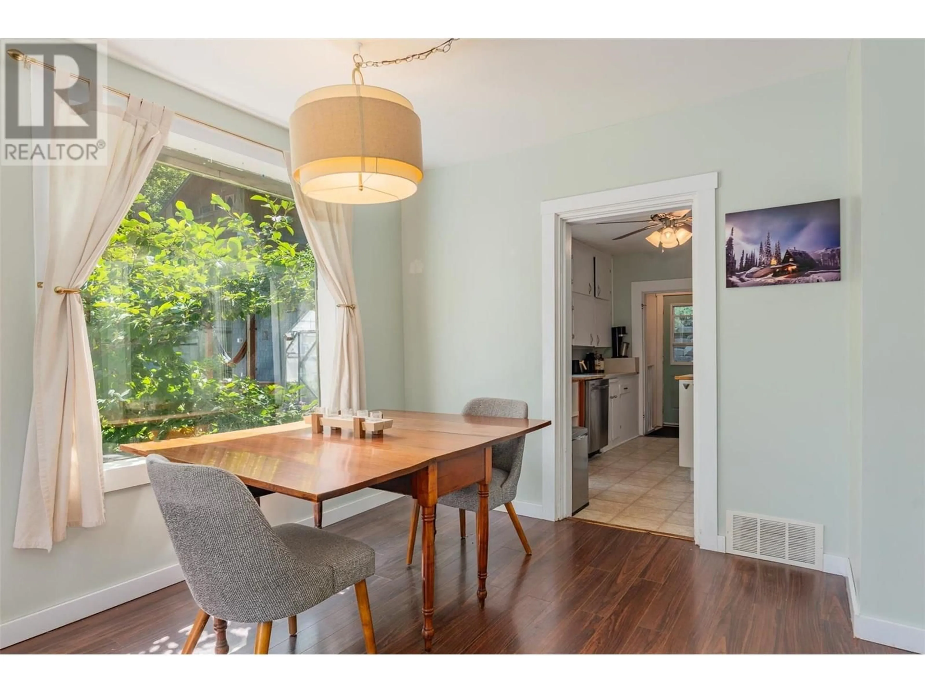 Dining room, wood/laminate floor for 204 UNION STREET, Nelson British Columbia V1L4A3
