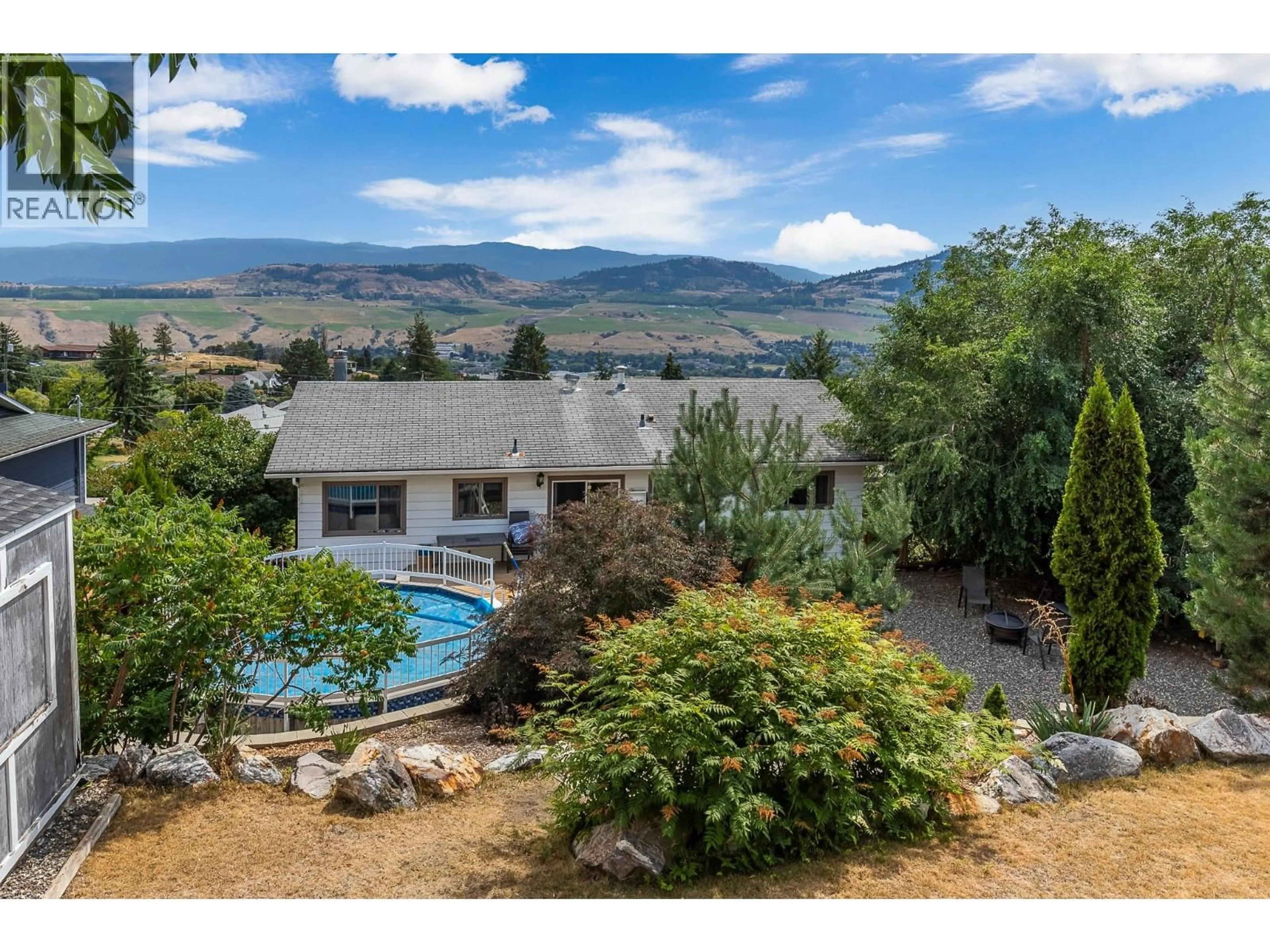A pic from outside/outdoor area/front of a property/back of a property/a pic from drone, mountain view for 6525 SOUTHWIND ROAD, Vernon British Columbia V1H1B7