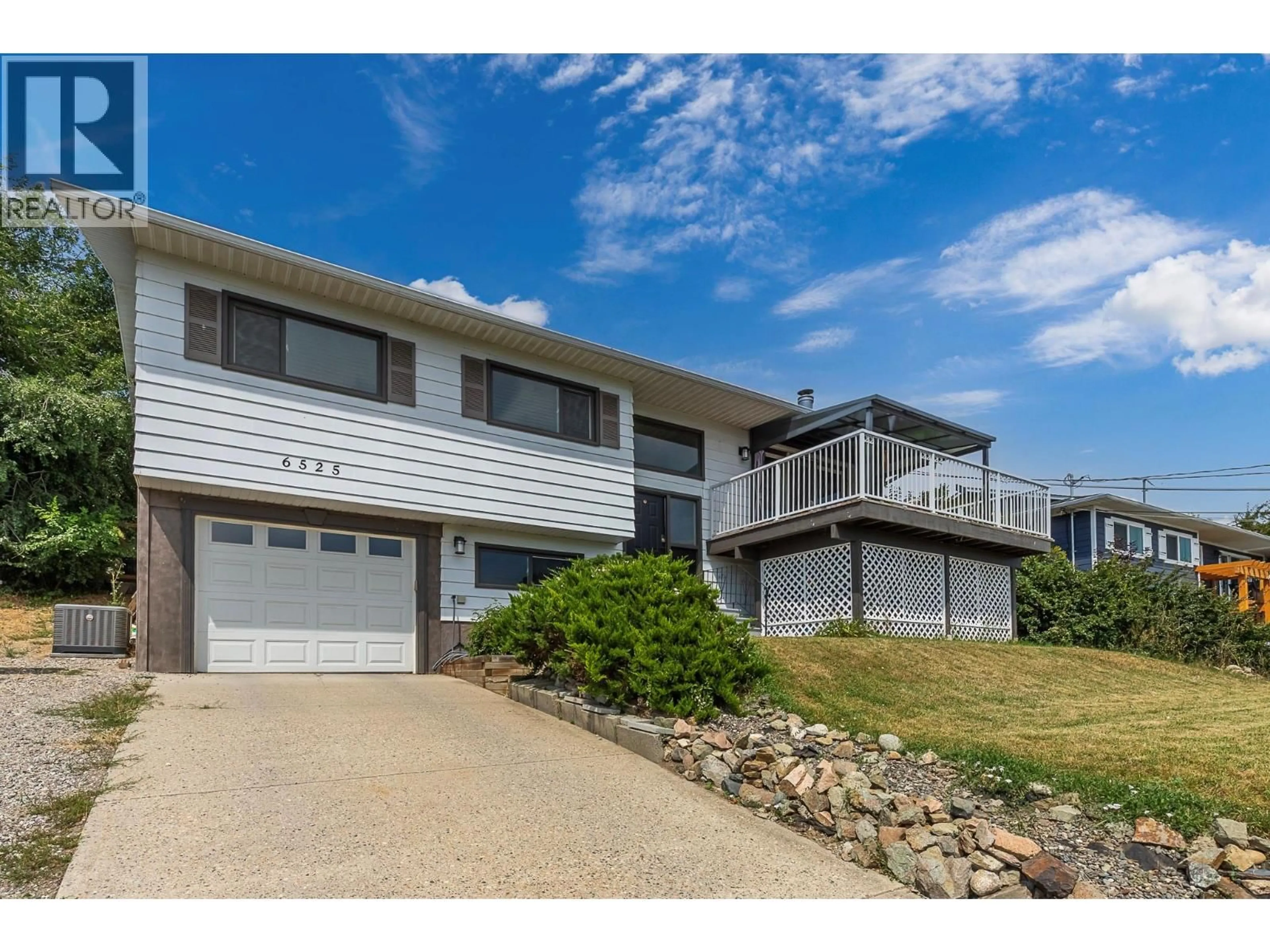 A pic from outside/outdoor area/front of a property/back of a property/a pic from drone, water/lake/river/ocean view for 6525 SOUTHWIND ROAD, Vernon British Columbia V1H1B7