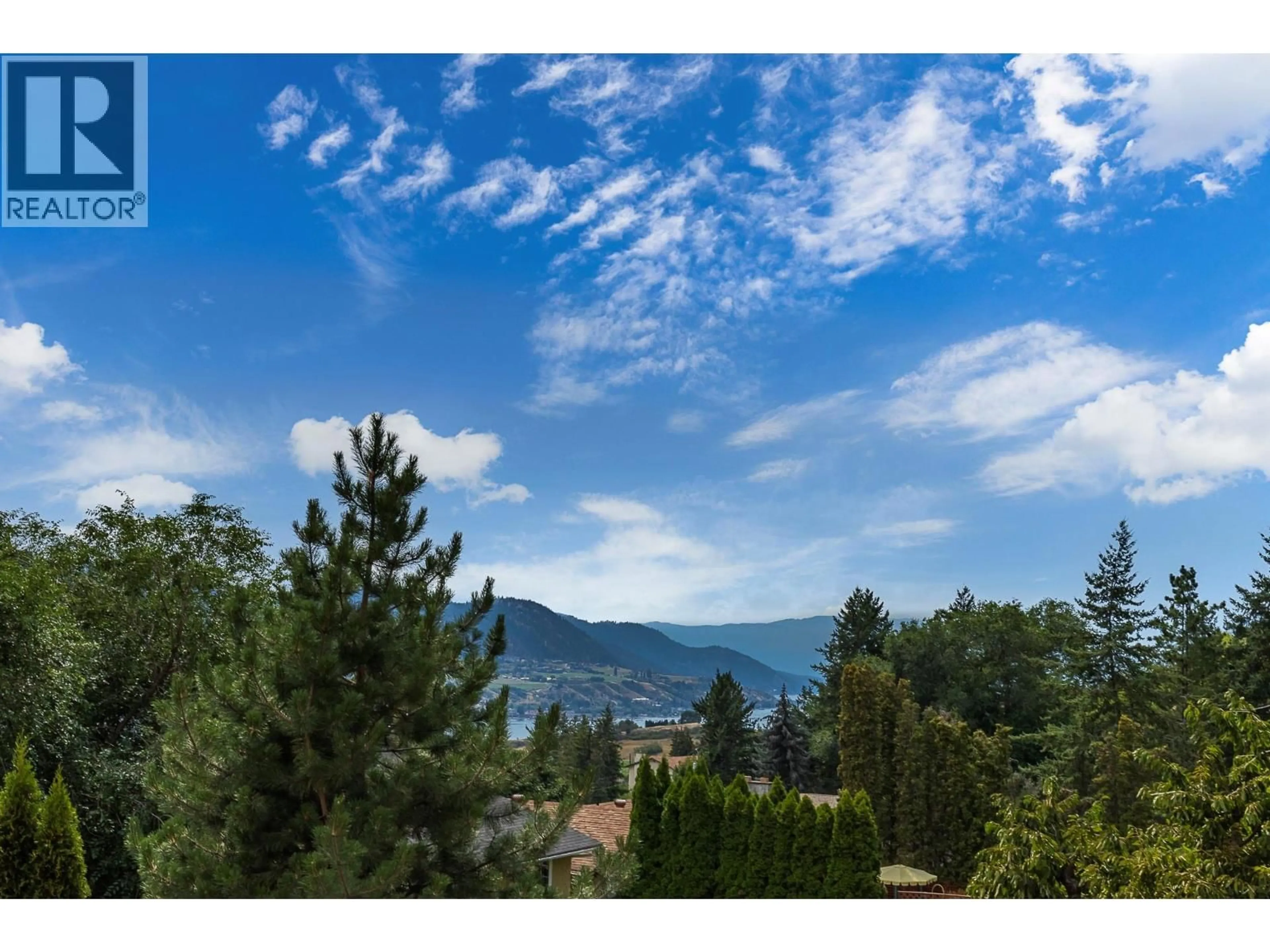 A pic from outside/outdoor area/front of a property/back of a property/a pic from drone, water/lake/river/ocean view for 6525 SOUTHWIND ROAD, Vernon British Columbia V1H1B7