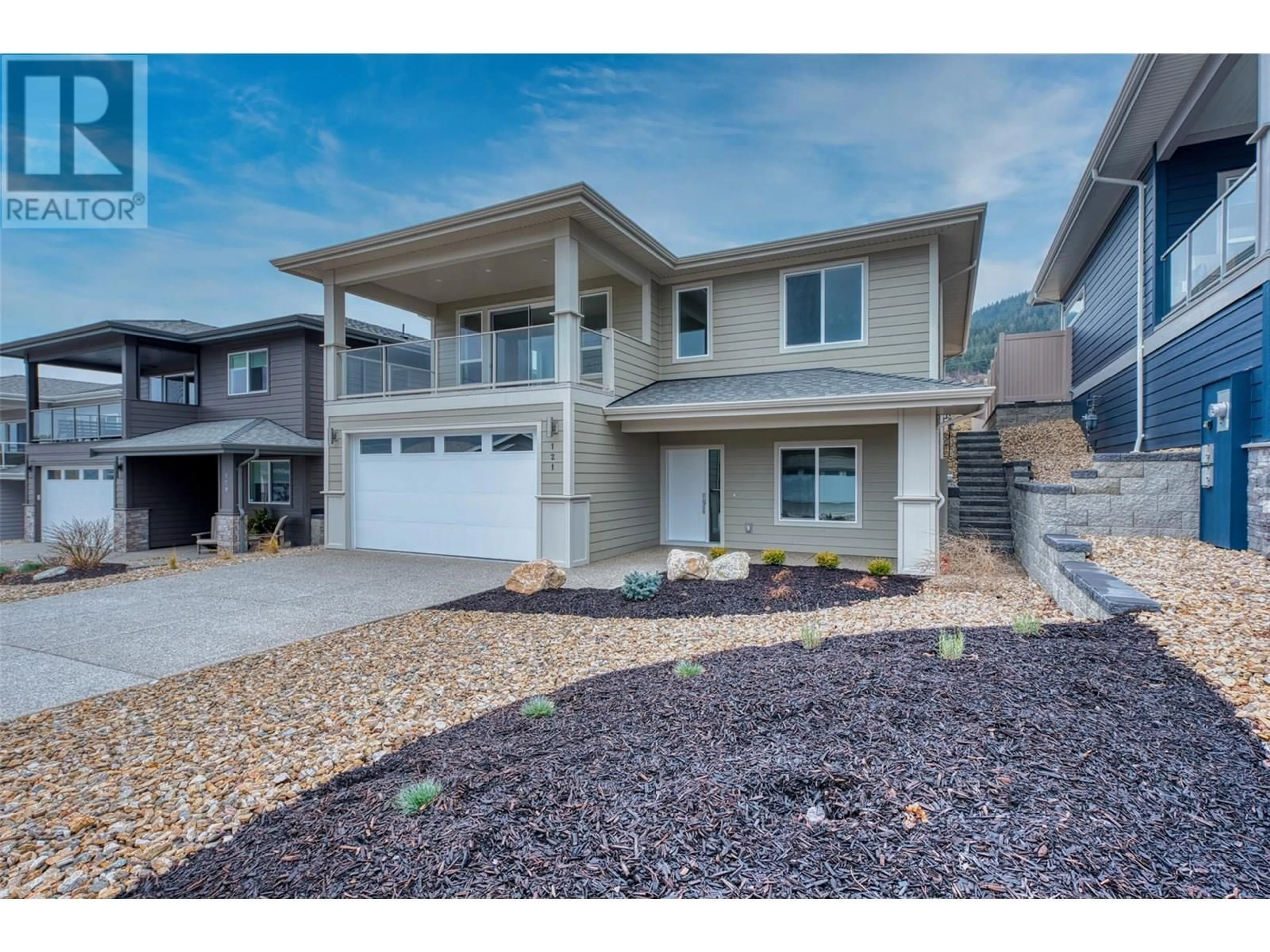 Home with vinyl exterior material, street for 121 - 7760 OKANAGAN LANDING ROAD, Okanagan Landing British Columbia V1H1H2