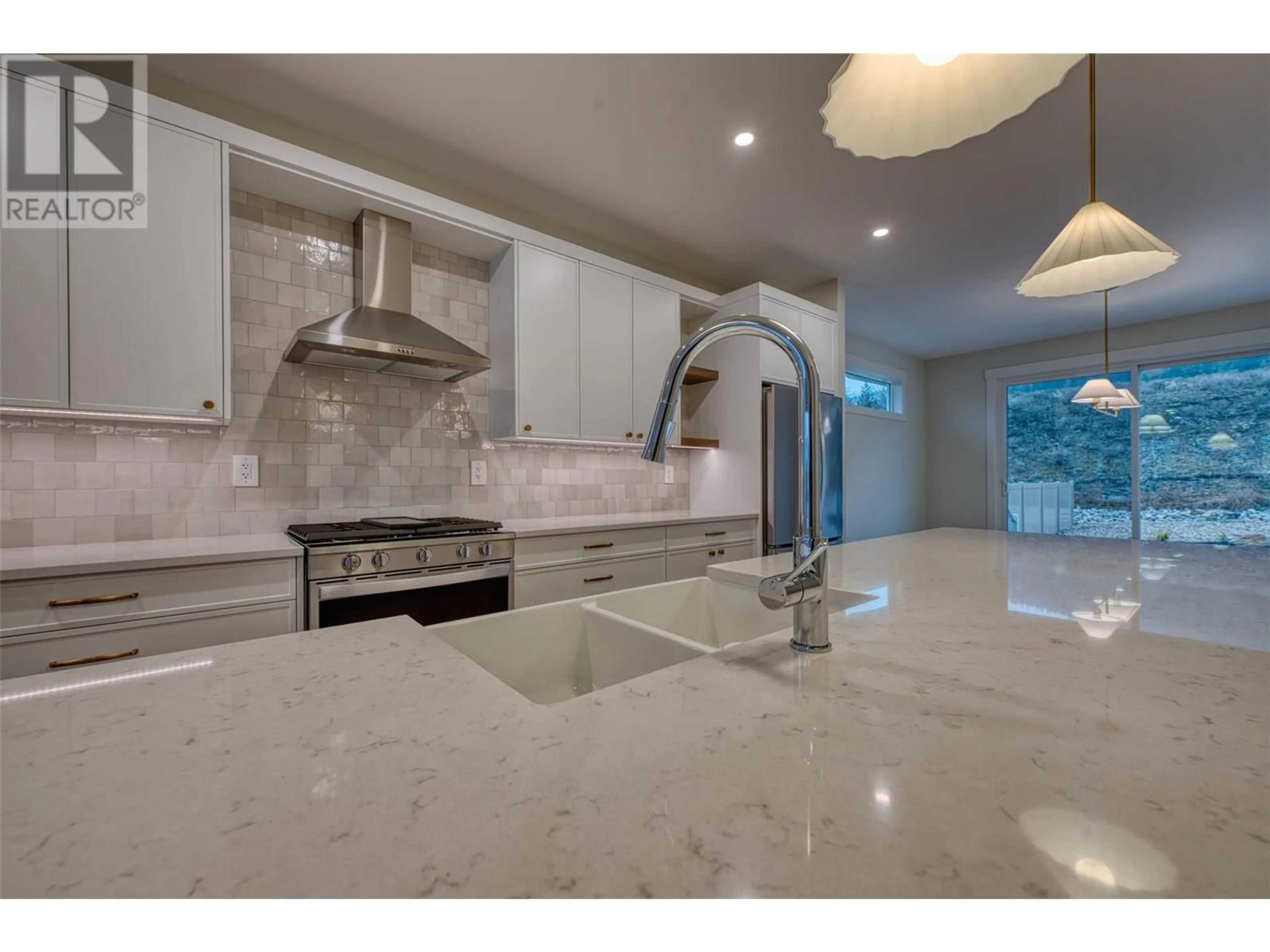 Open concept kitchen, ceramic/tile floor for 121 - 7760 OKANAGAN LANDING ROAD, Okanagan Landing British Columbia V1H1H2