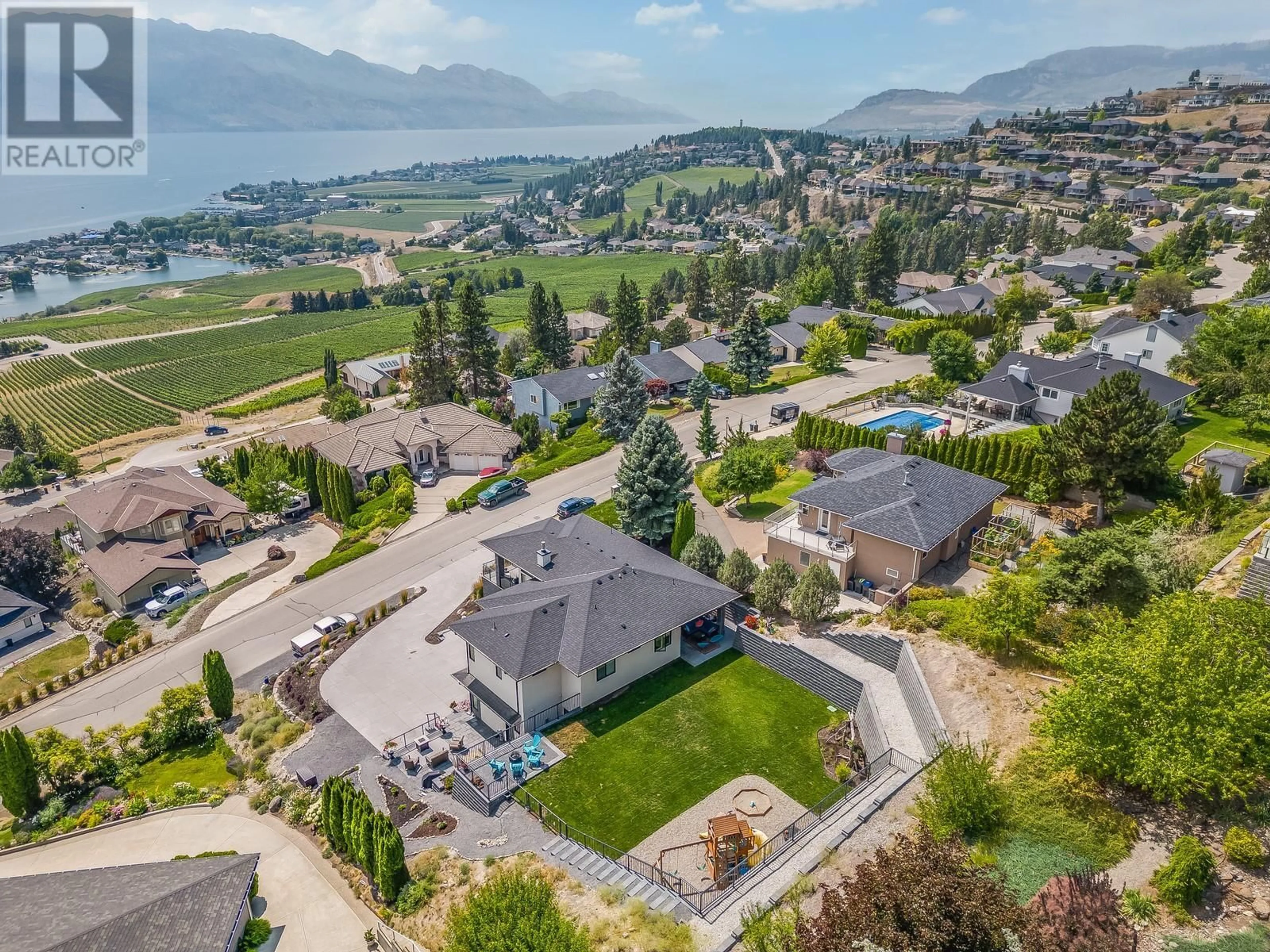 A pic from outside/outdoor area/front of a property/back of a property/a pic from drone, mountain view for 1296 MENU ROAD, West Kelowna British Columbia V1Z3K2