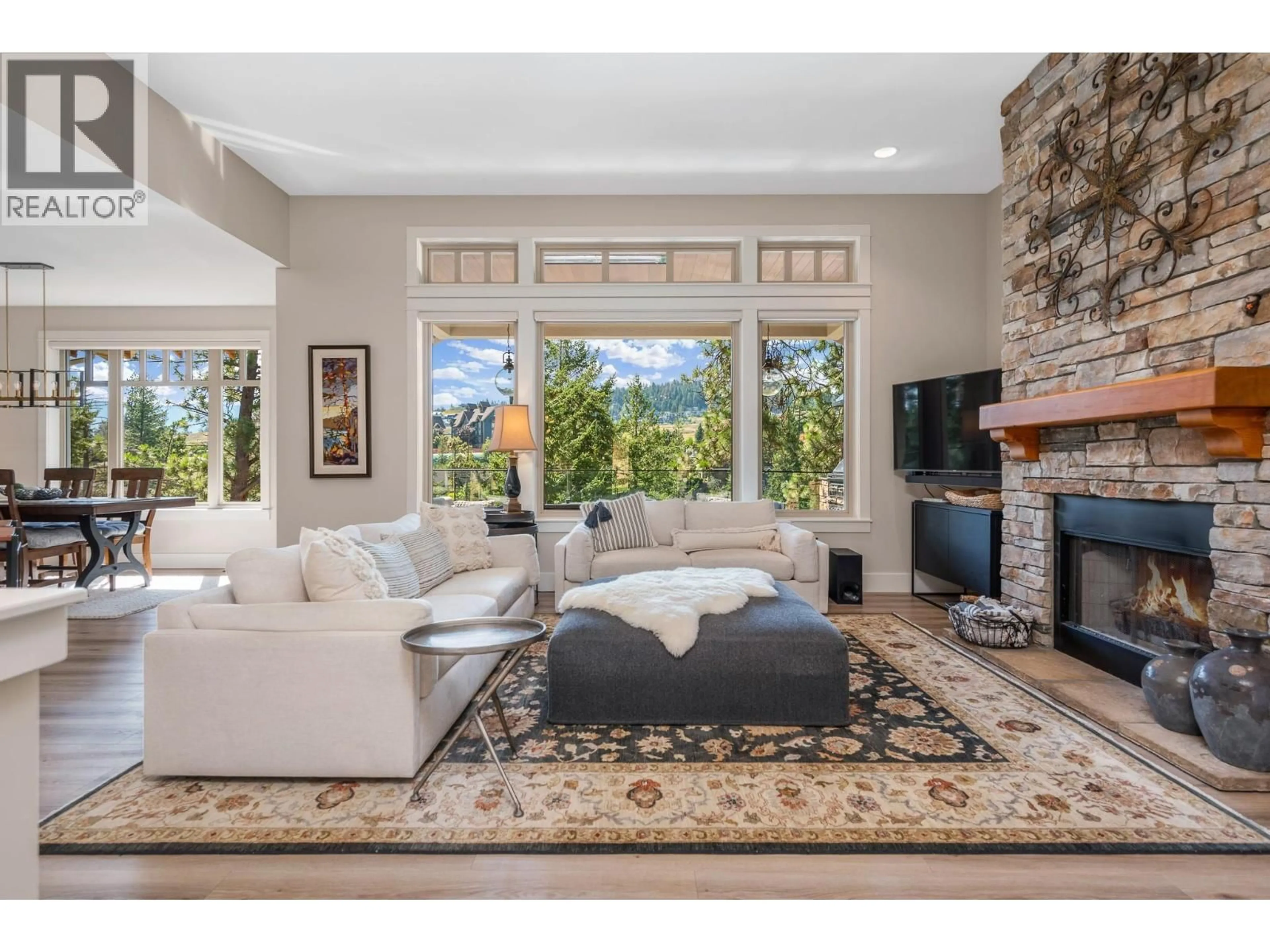Living room with furniture, ceramic/tile floor for 208 CHICOPEE ROAD, Vernon British Columbia V1H1V5
