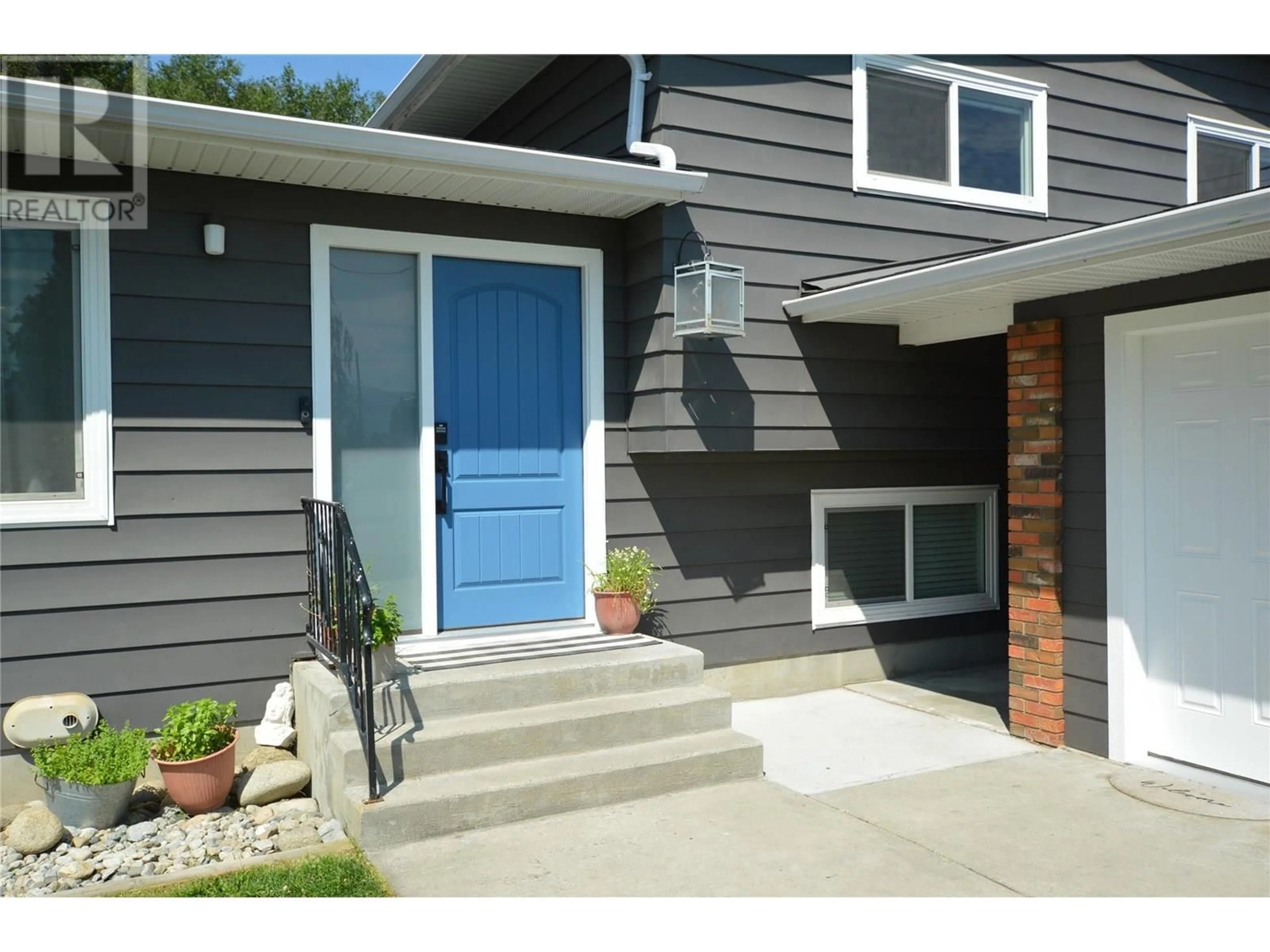 Home with vinyl exterior material, street for 13814 YULE CRESCENT, Summerland British Columbia V0H1Z5