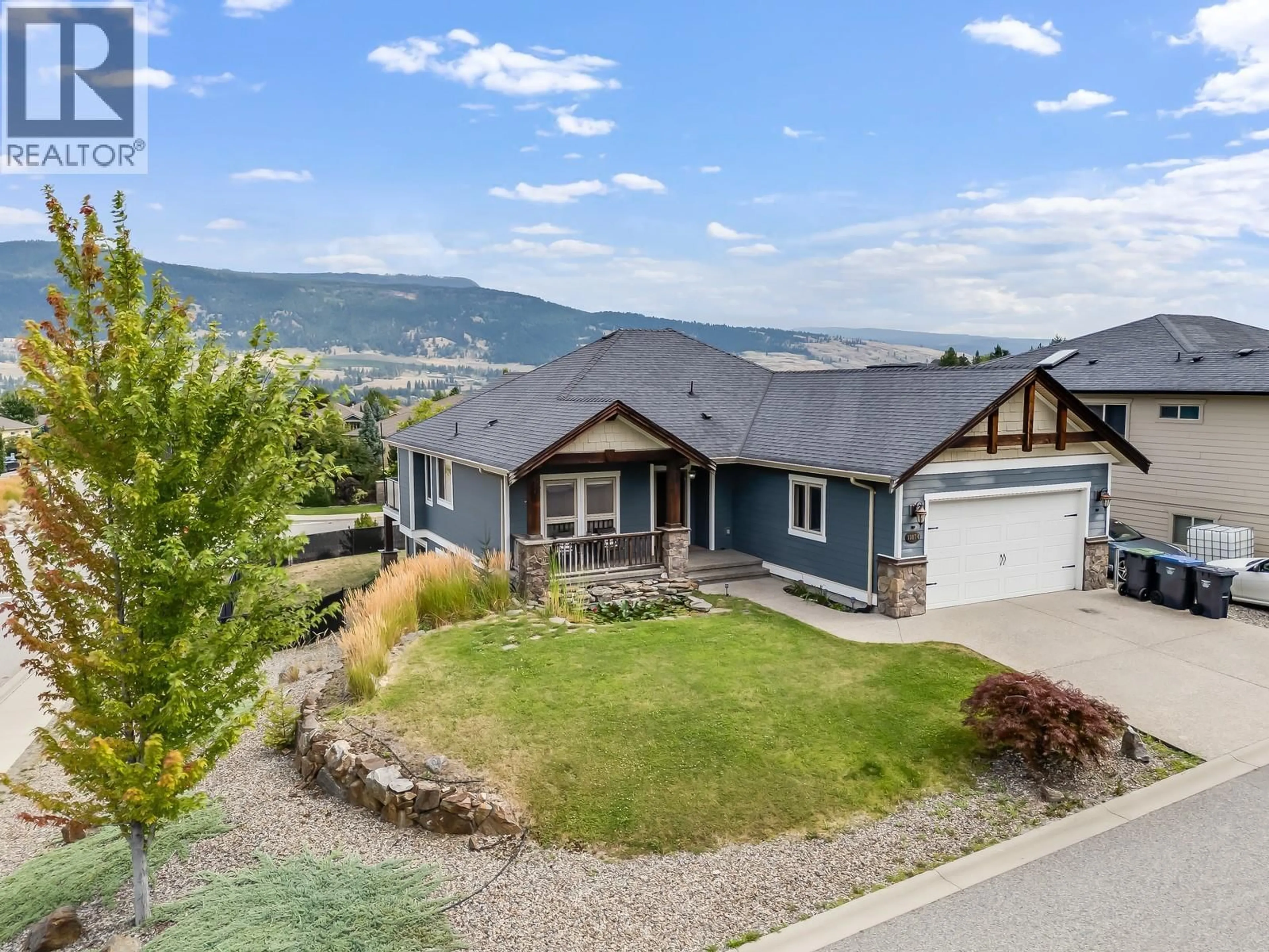 A pic from outside/outdoor area/front of a property/back of a property/a pic from drone, mountain view for 13074 LAKE HILL DRIVE, Lake Country British Columbia V4V2P8