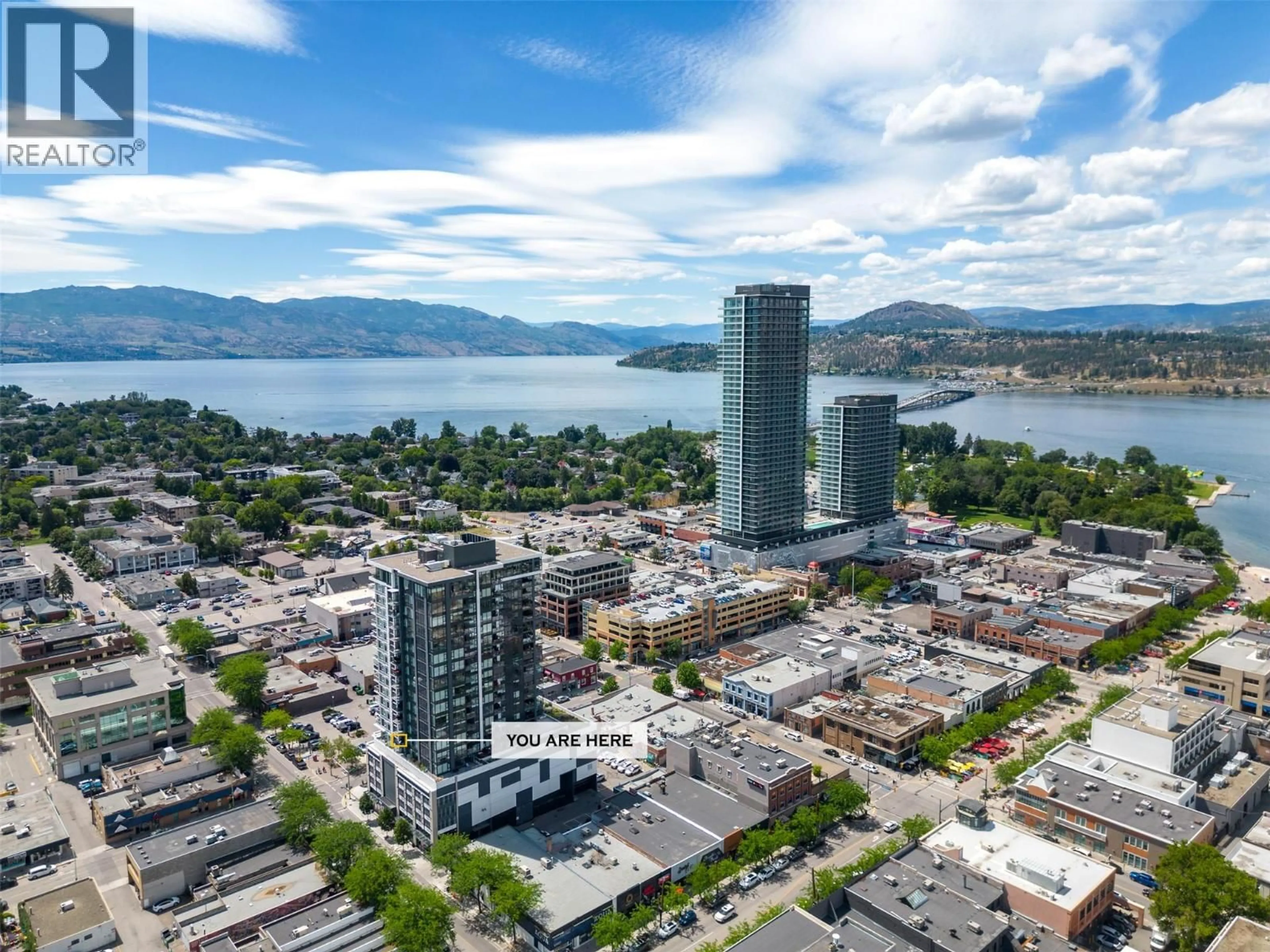A pic from outside/outdoor area/front of a property/back of a property/a pic from drone, water/lake/river/ocean view for 703 - 1588 ELLIS STREET, Kelowna British Columbia V1Y0H1