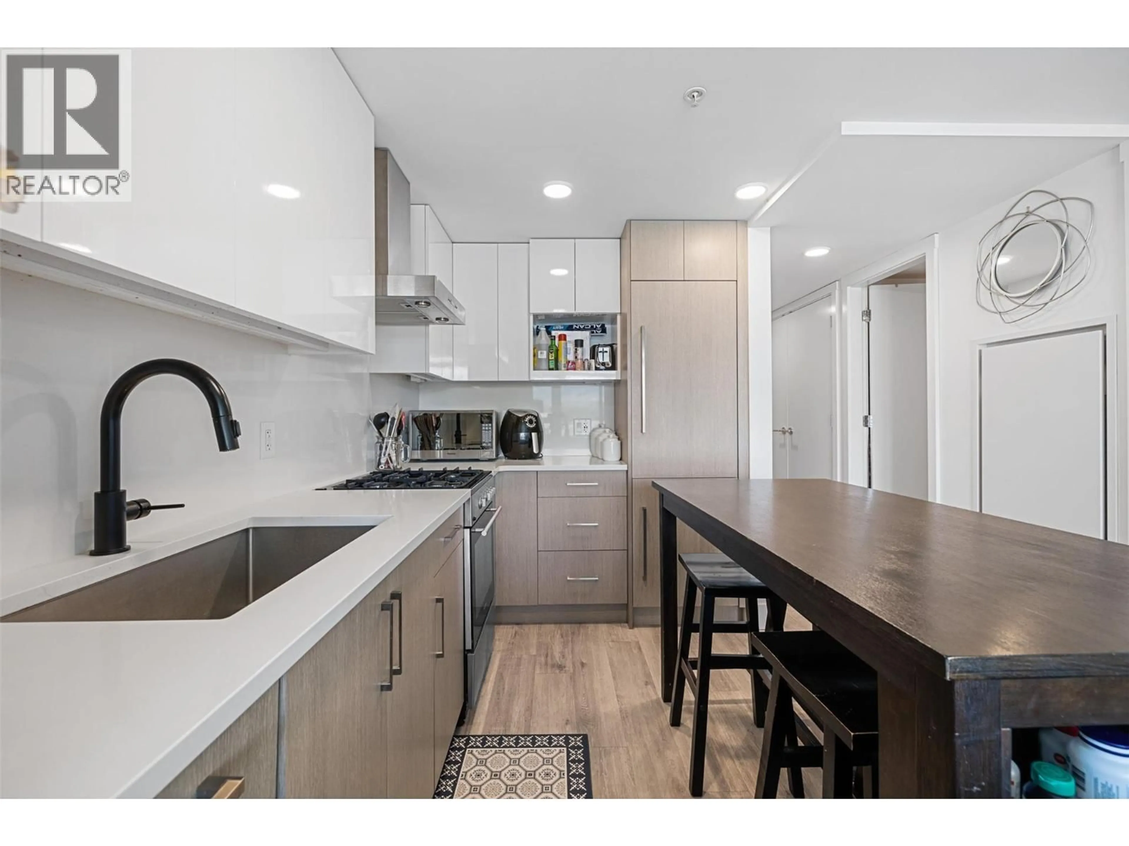 Open concept kitchen, unknown for 703 - 1588 ELLIS STREET, Kelowna British Columbia V1Y0H1