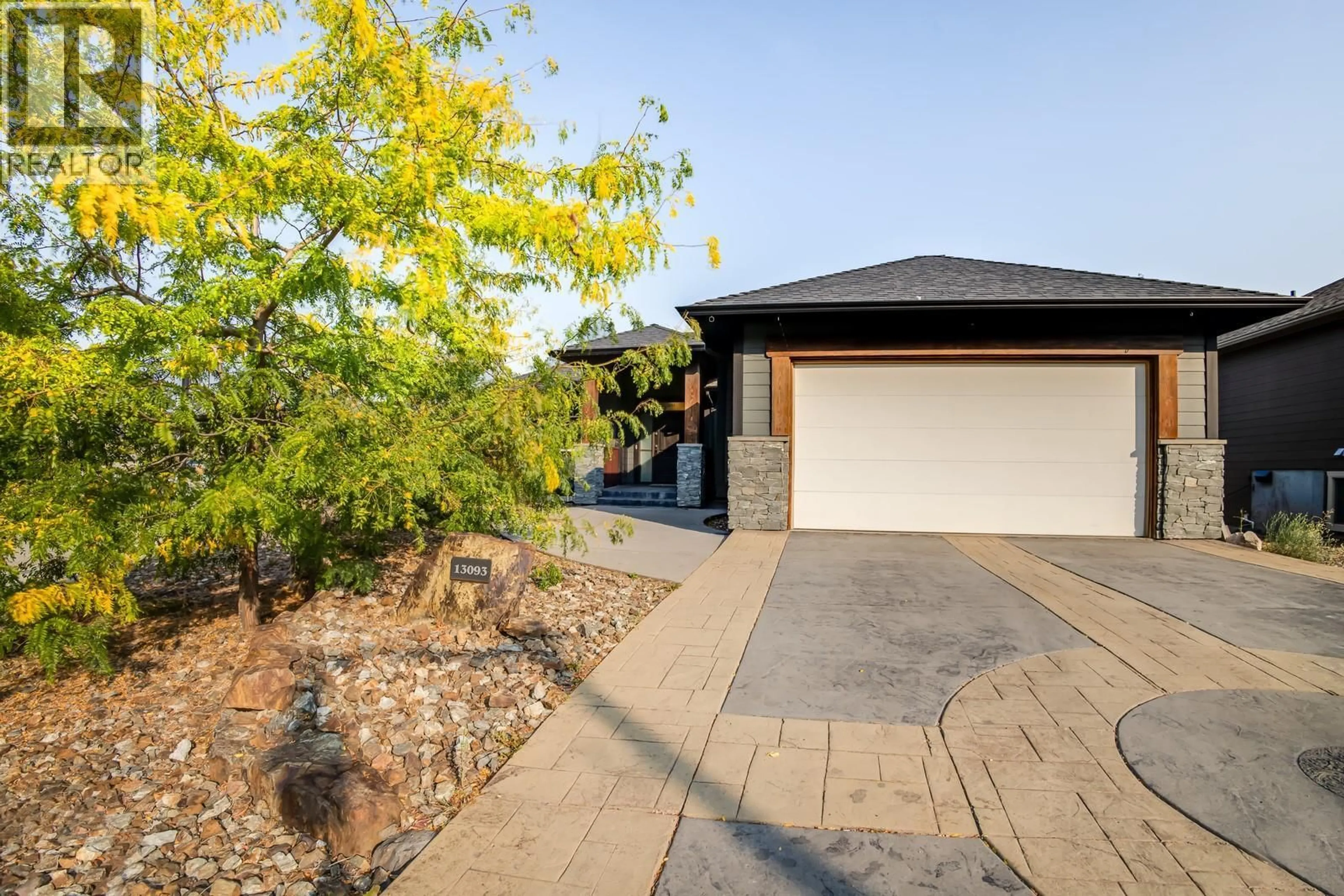 A pic from outside/outdoor area/front of a property/back of a property/a pic from drone, street for 13093 SHORELINE DRIVE, Lake Country British Columbia V4V2N8