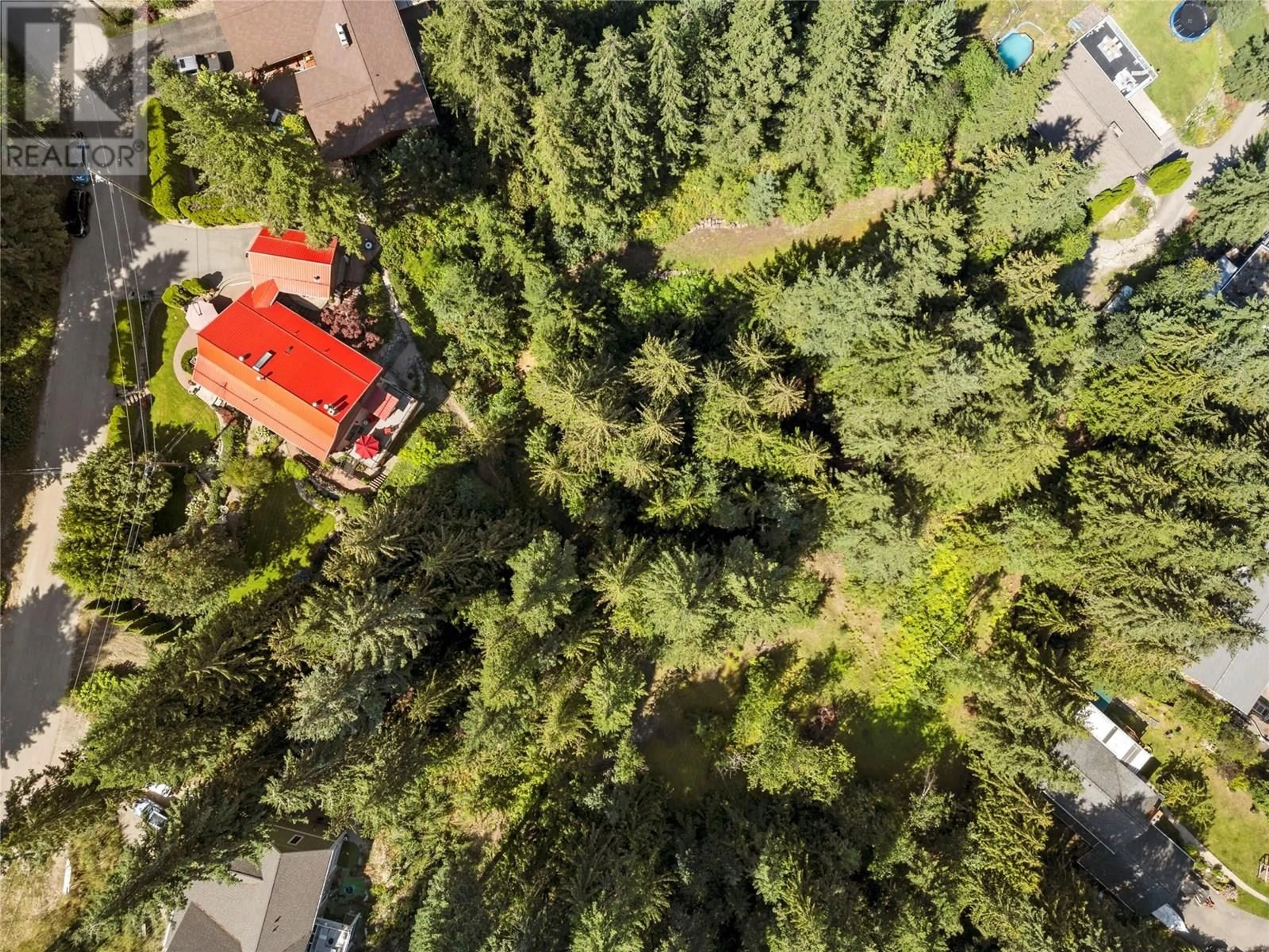 A pic from outside/outdoor area/front of a property/back of a property/a pic from drone, forest/trees view for 2726 TRANQUIL PLACE, Blind Bay British Columbia V0E1H2