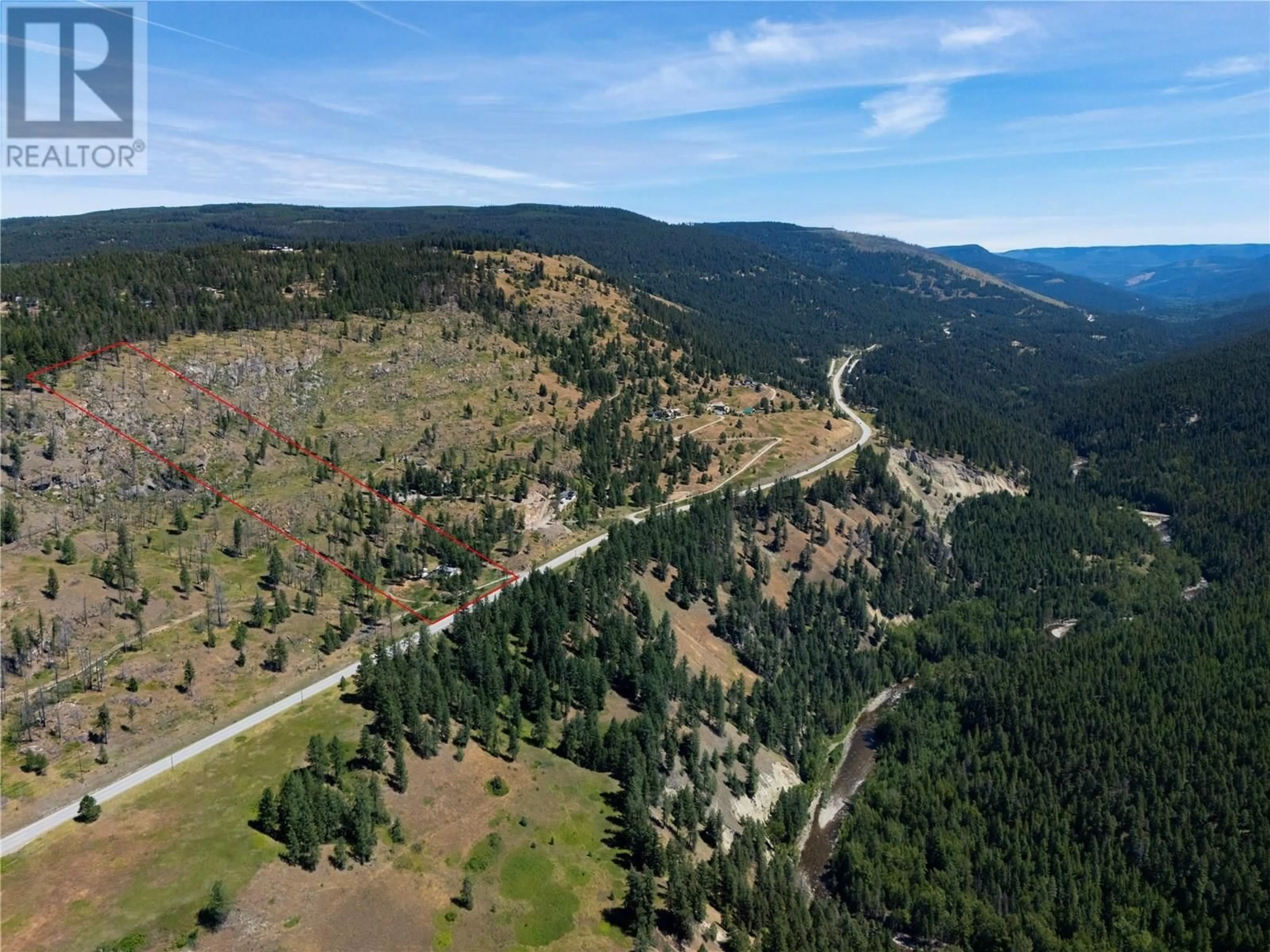 A pic from outside/outdoor area/front of a property/back of a property/a pic from drone, forest/trees view for 6090 HIGHWAY 33 OTHER, Kelowna British Columbia V1P1H8