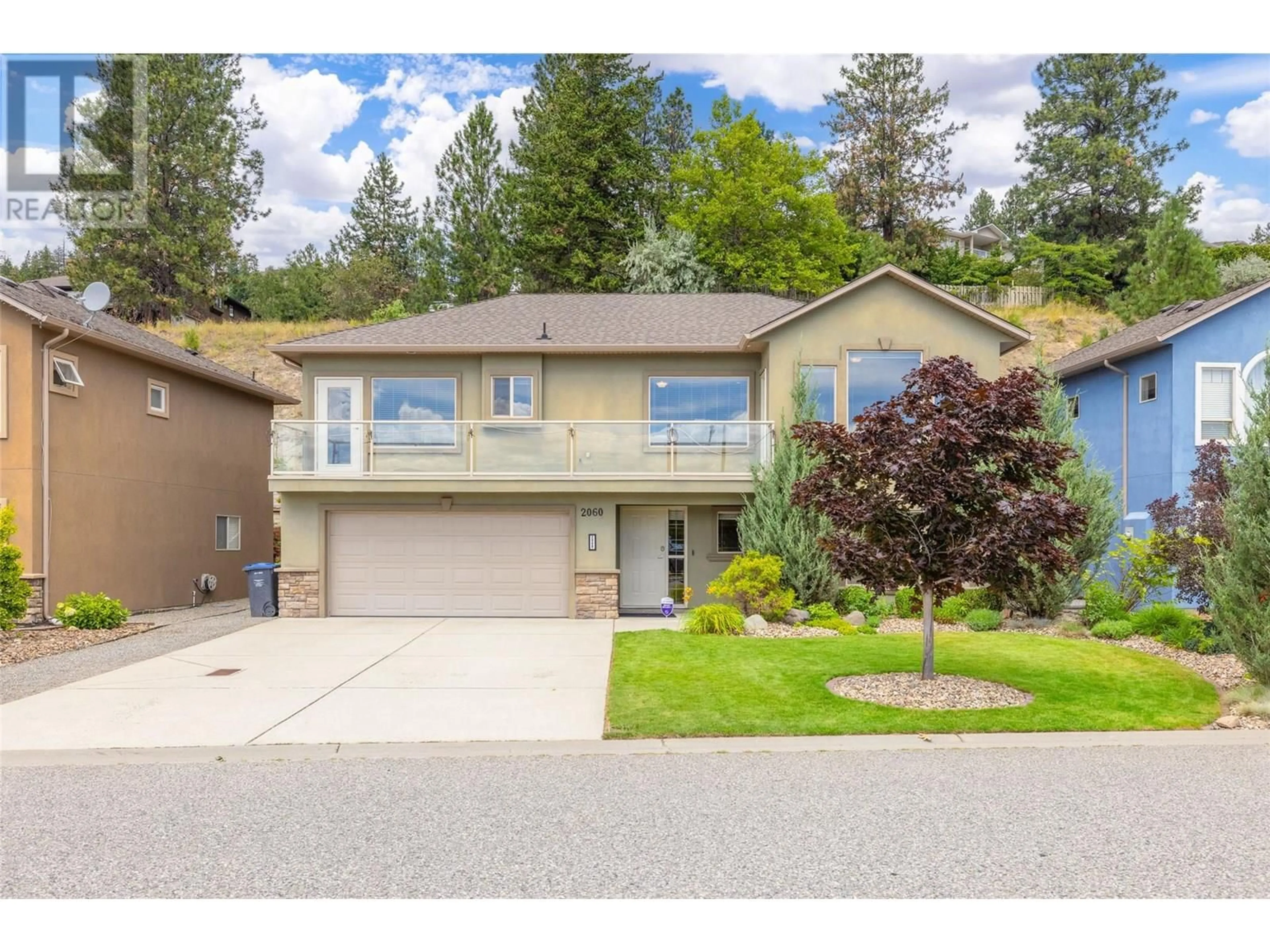 Home with vinyl exterior material, street for 2060 SPYGLASS WAY, West Kelowna British Columbia V1Z3Z7