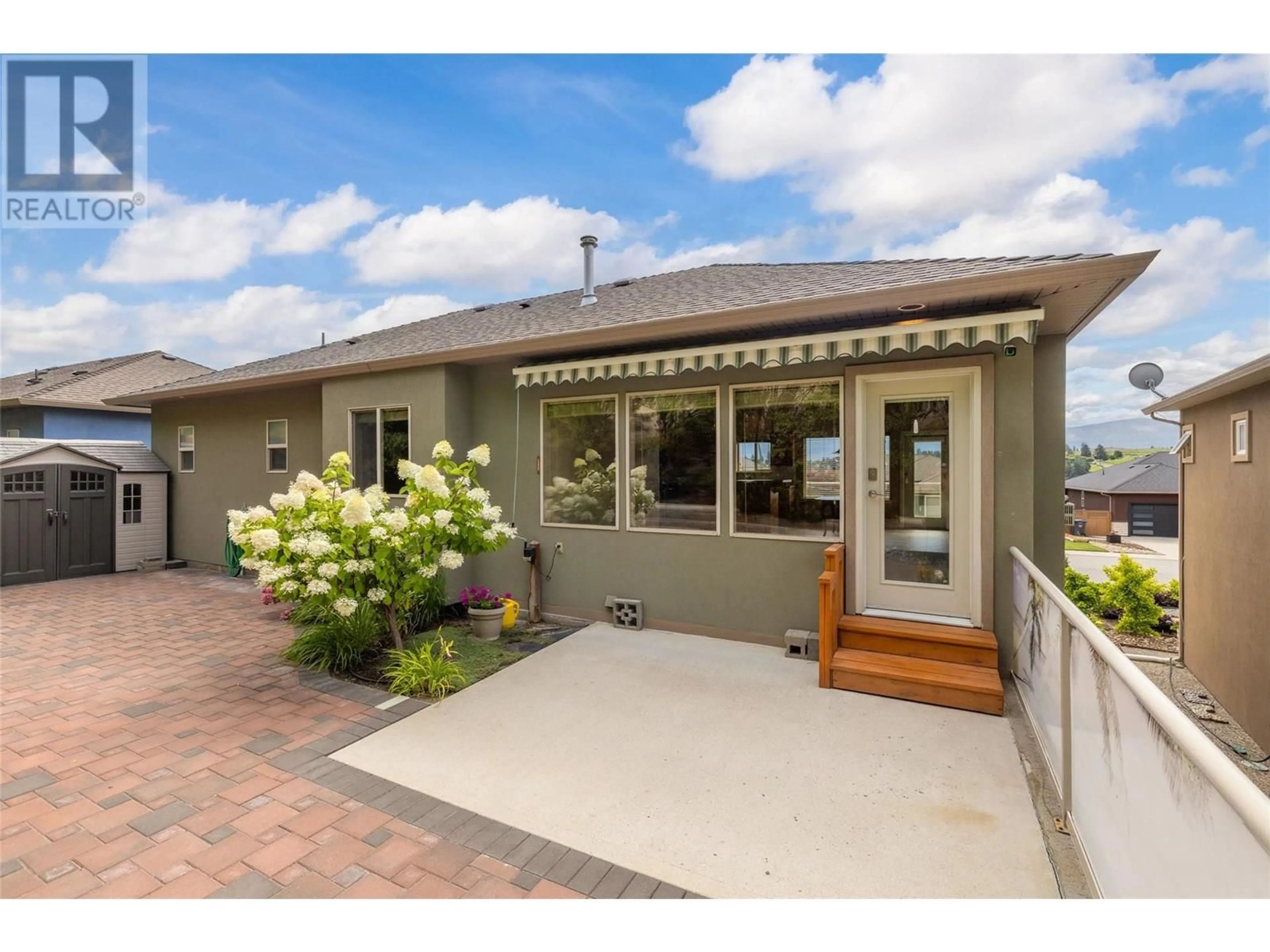 Home with vinyl exterior material, street for 2060 SPYGLASS WAY, West Kelowna British Columbia V1Z3Z7
