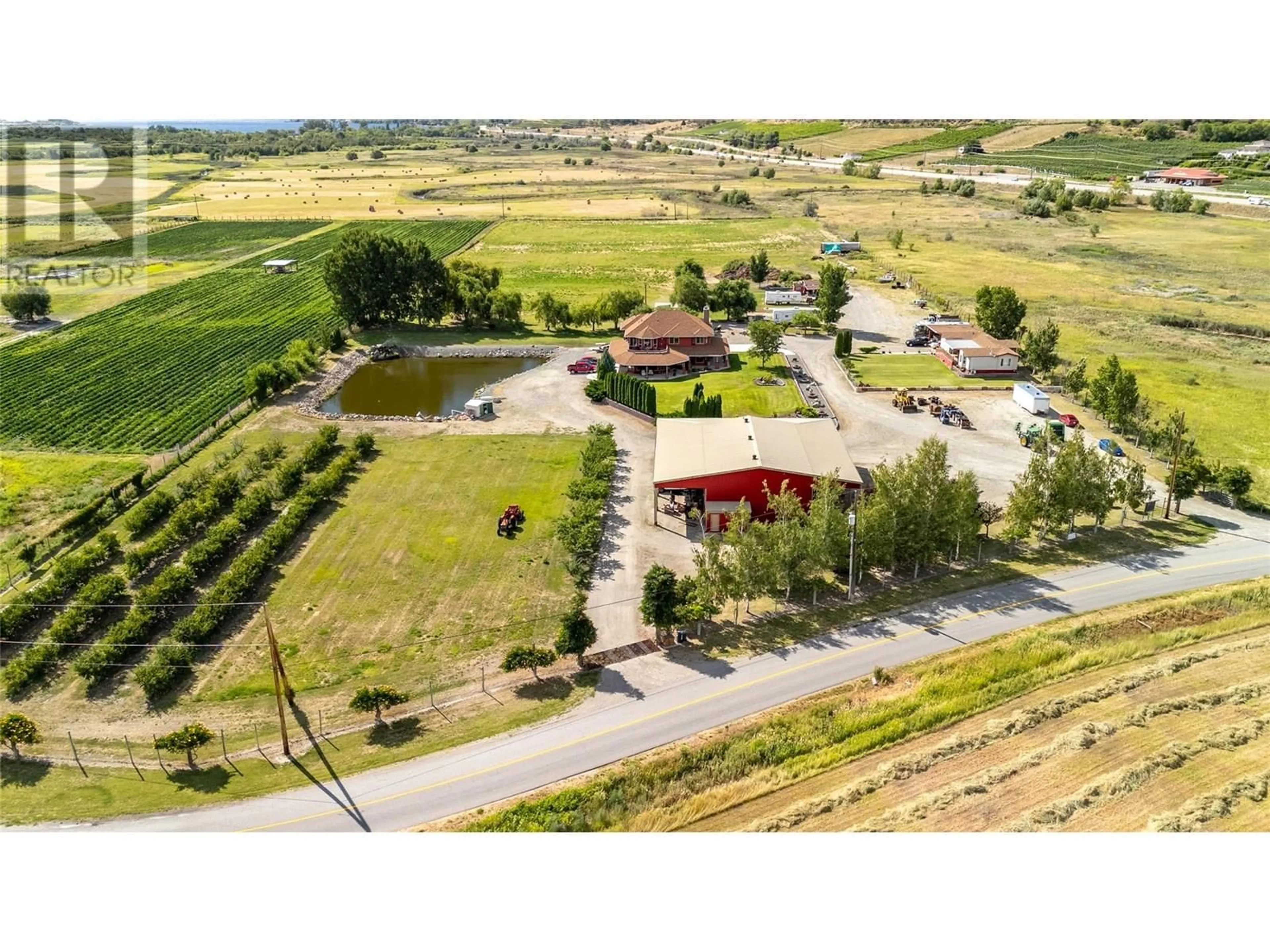 A pic from outside/outdoor area/front of a property/back of a property/a pic from drone, unknown for 8705 ROAD 22 ROAD, Oliver British Columbia V0H1T1