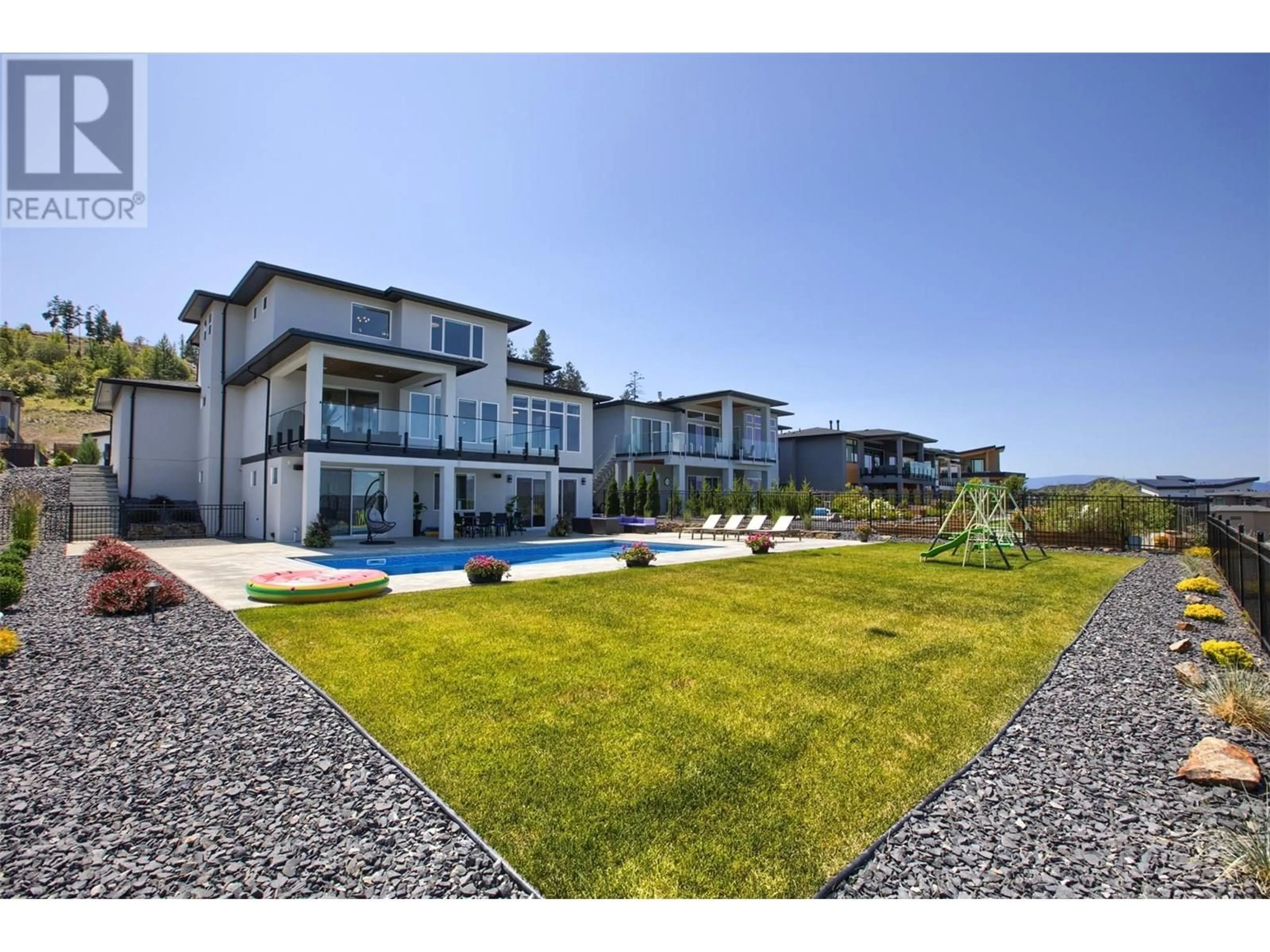 A pic from outside/outdoor area/front of a property/back of a property/a pic from drone, unknown for 446 HAWK HILL DRIVE, Kelowna British Columbia V1W0B1