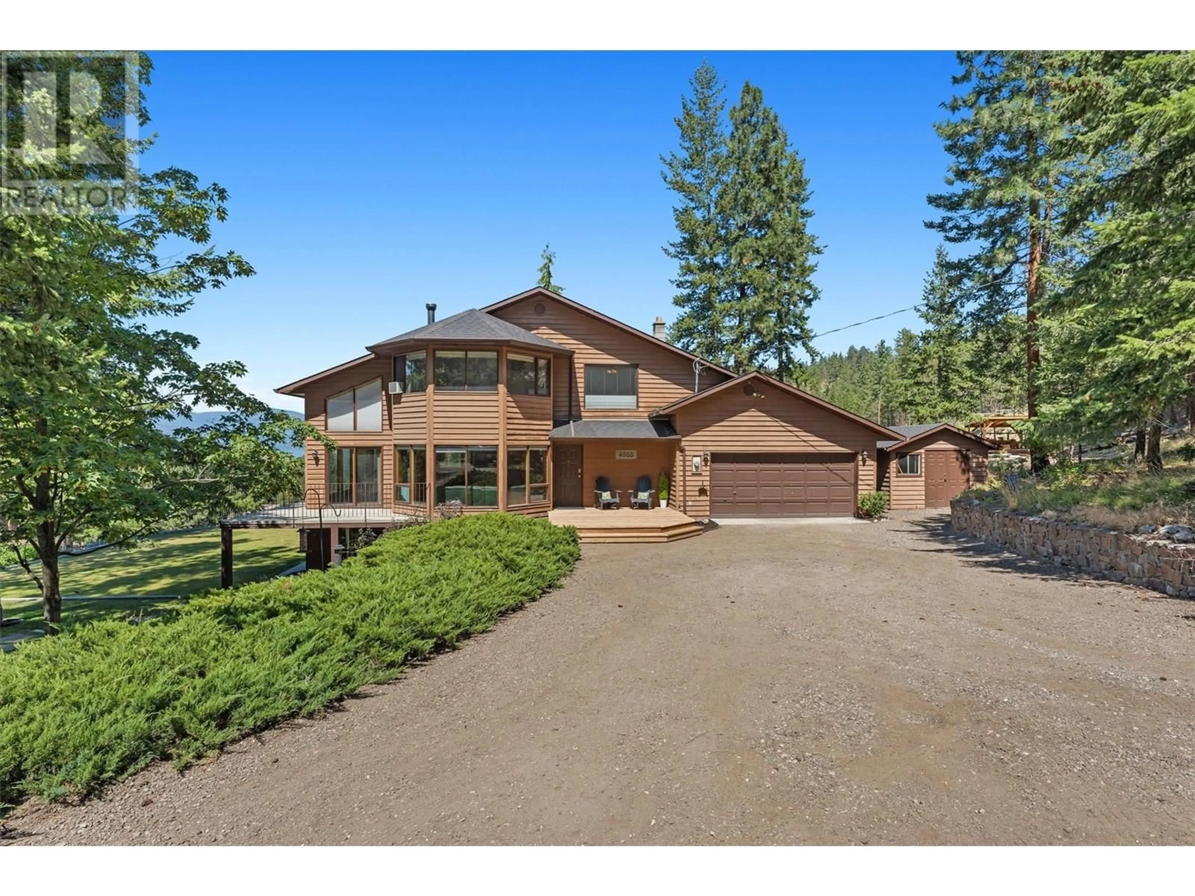A pic from outside/outdoor area/front of a property/back of a property/a pic from drone, mountain view for 4555 OTTLEY ROAD, Lake Country British Columbia V4K1N1