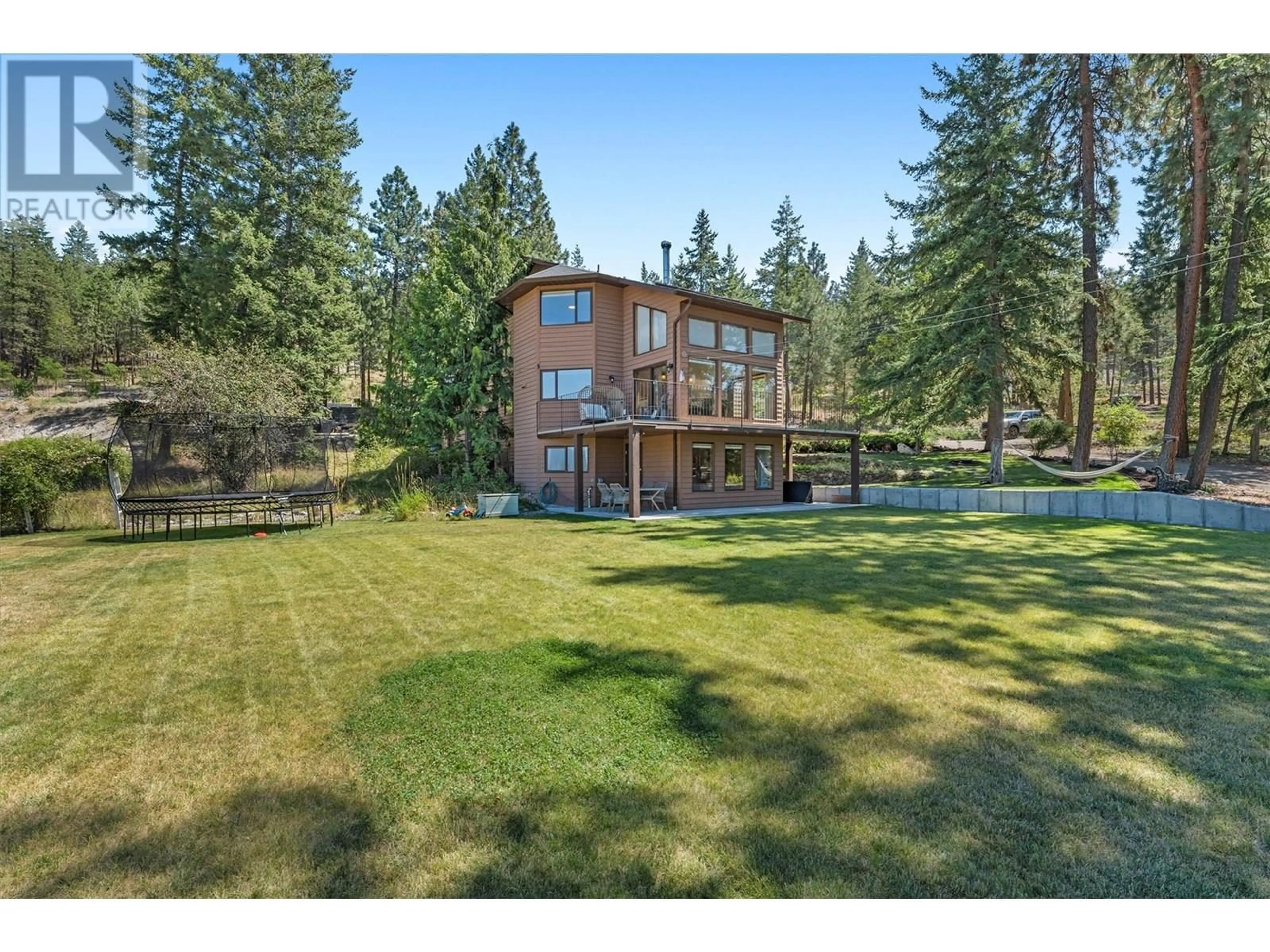 A pic from outside/outdoor area/front of a property/back of a property/a pic from drone, water/lake/river/ocean view for 4555 OTTLEY ROAD, Lake Country British Columbia V4K1N1