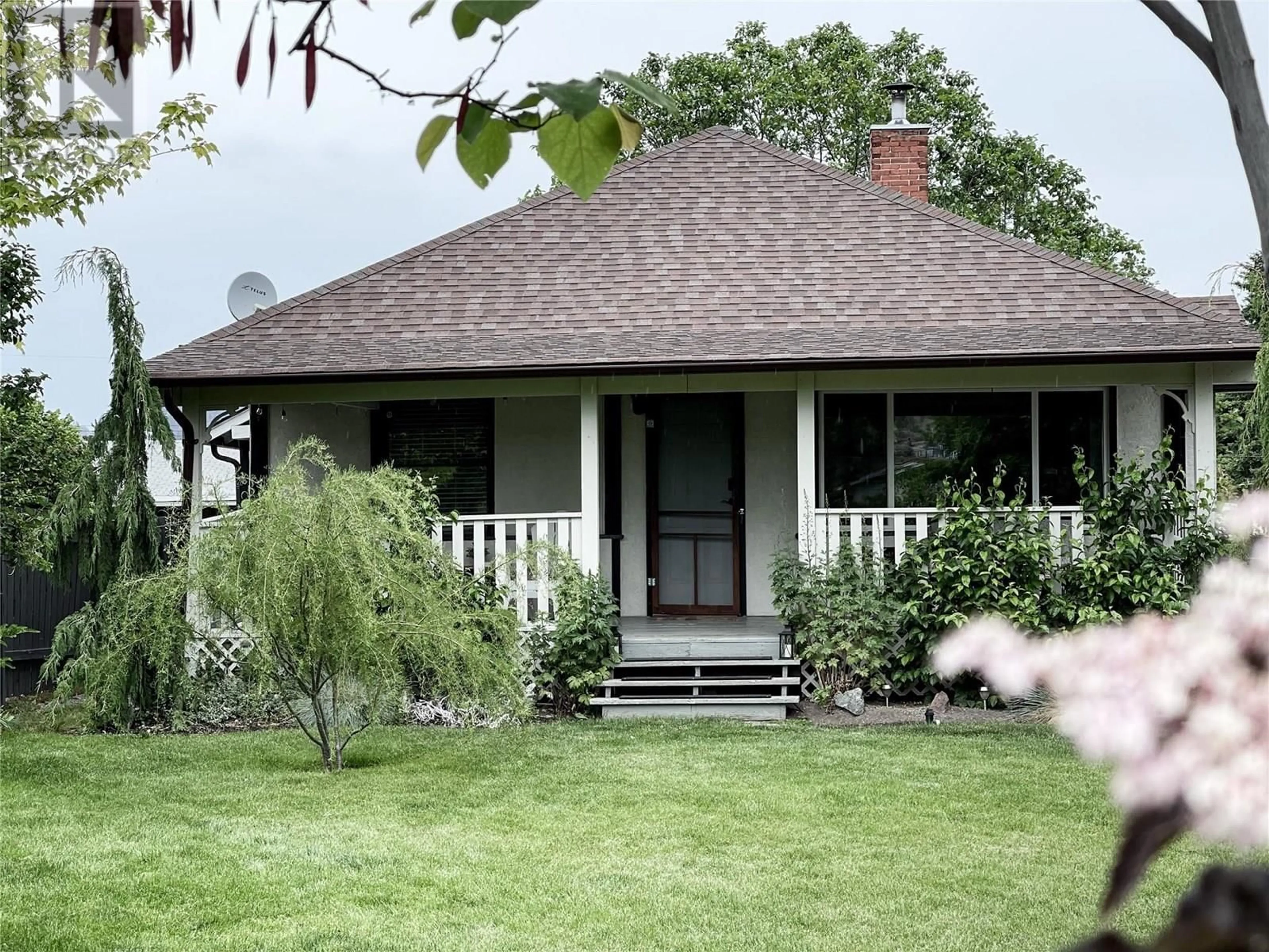 Home with vinyl exterior material, street for 10918 PRAIRIE VALLEY ROAD, Summerland British Columbia V0H1Z8