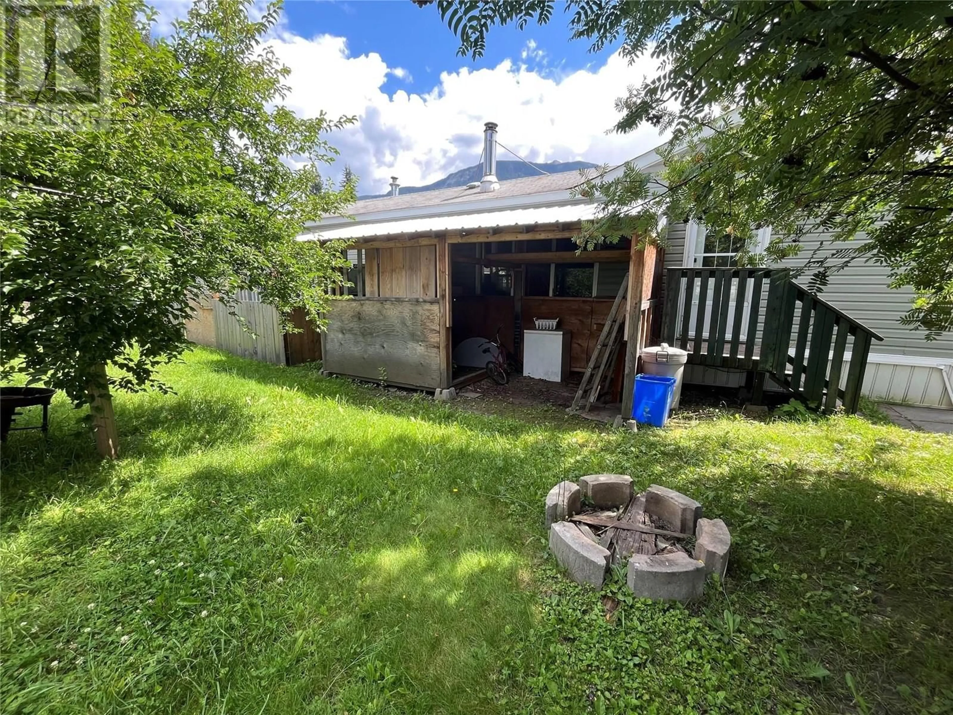 A pic from outside/outdoor area/front of a property/back of a property/a pic from drone, building for 39 - 310 HUMBERT STREET, Revelstoke British Columbia V0E2S0
