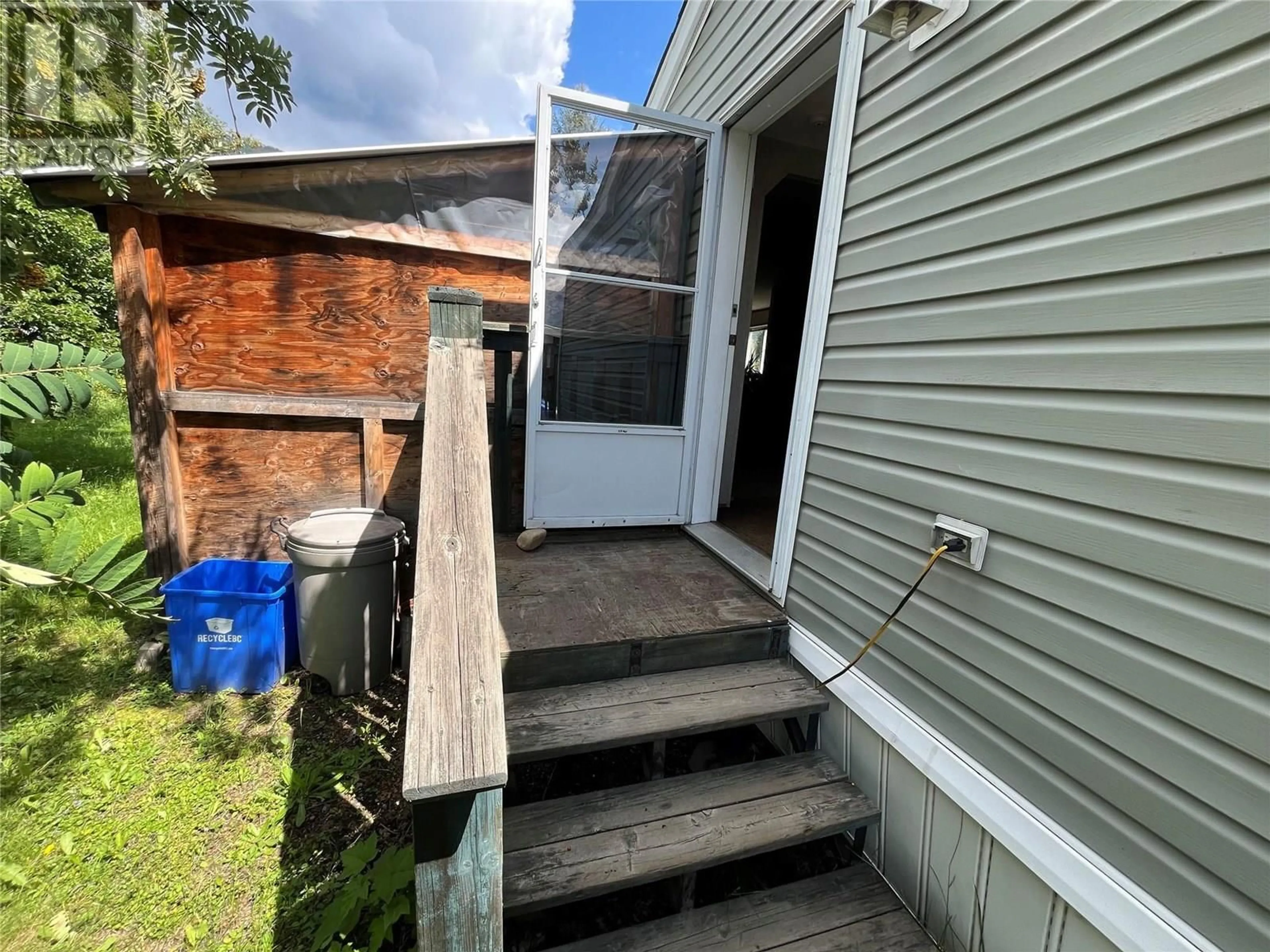 A pic from outside/outdoor area/front of a property/back of a property/a pic from drone, street for 39 - 310 HUMBERT STREET, Revelstoke British Columbia V0E2S0