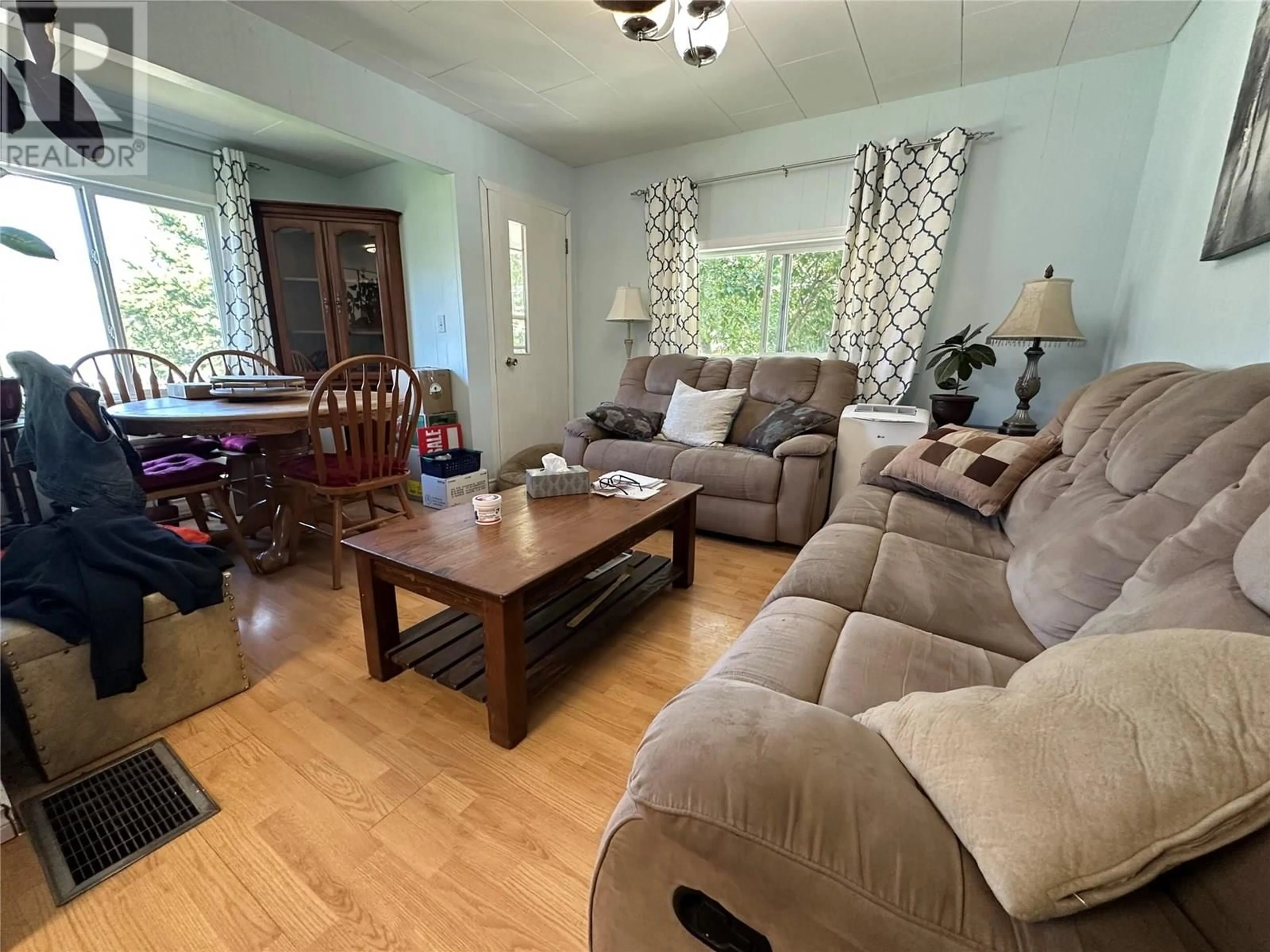 Living room with furniture, wood/laminate floor for 7080 SAVONA ACCESS ROAD, Kamloops British Columbia V0K2J0