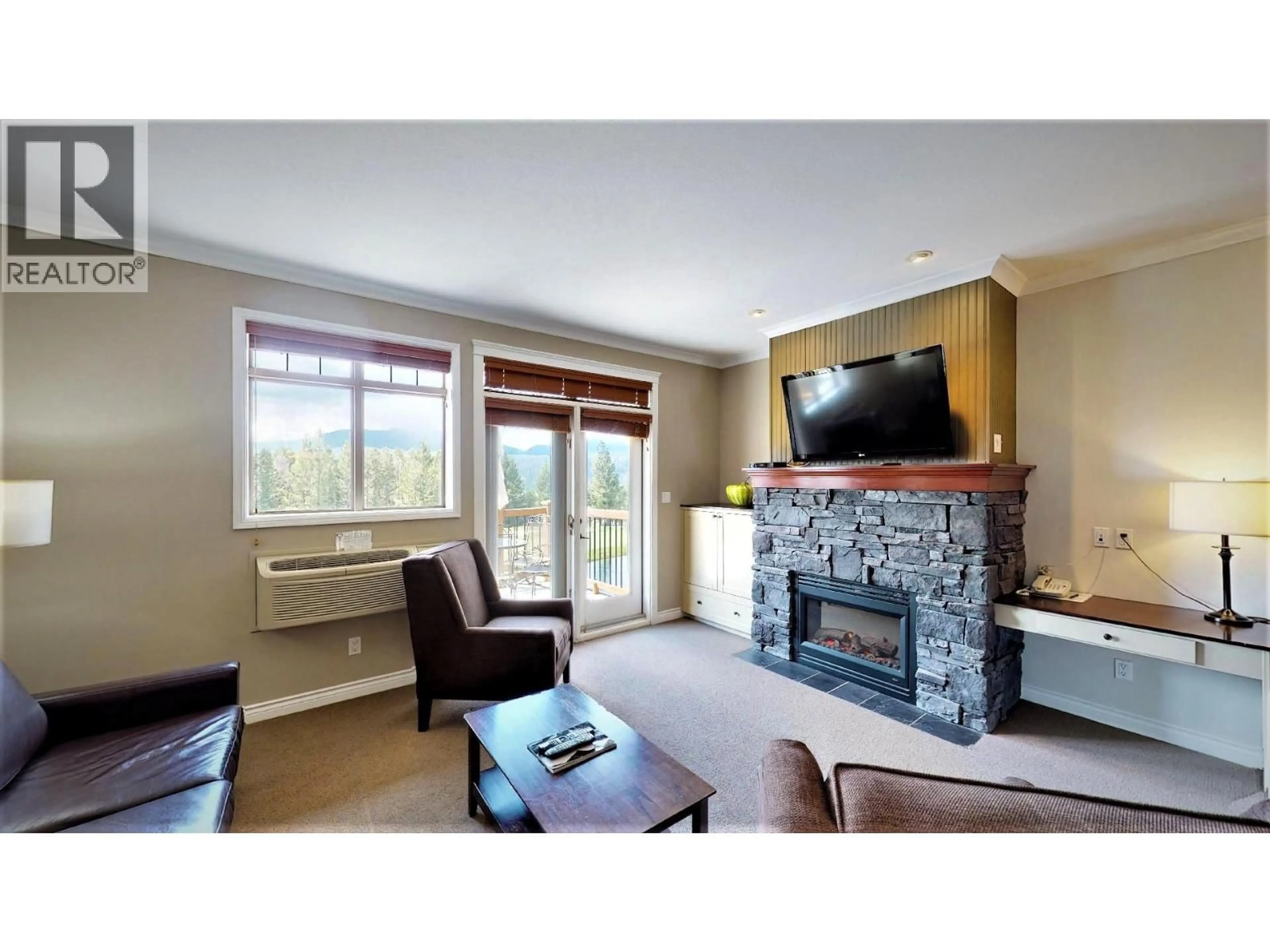 Living room with furniture, wood/laminate floor for 234 B - 200 BIGHORN BOULEVARD, Radium Hot Springs British Columbia V0A1M0