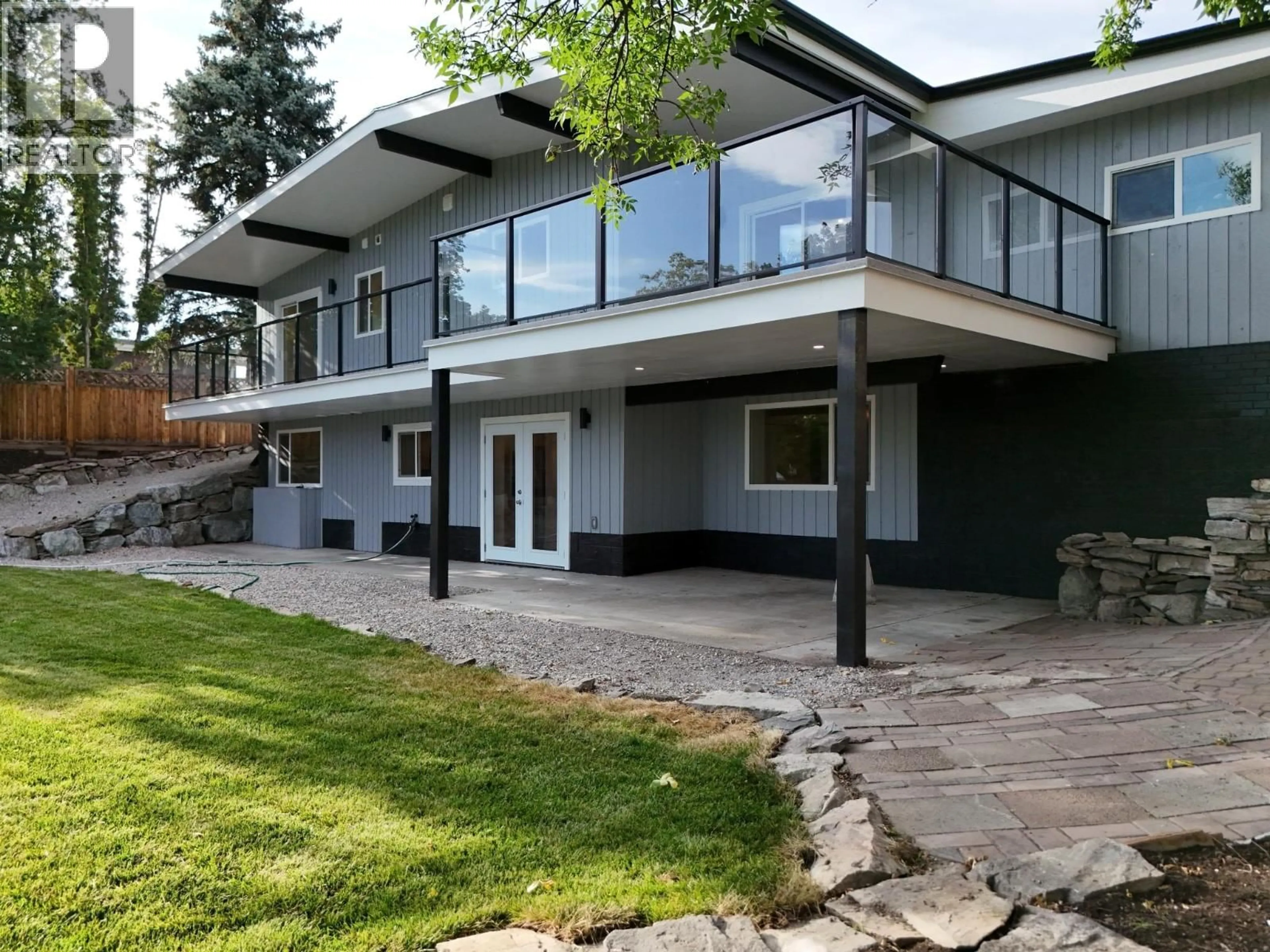 Home with vinyl exterior material, mountain view for 1457 ALTA VISTA ROAD, Kelowna British Columbia V1Y6K9