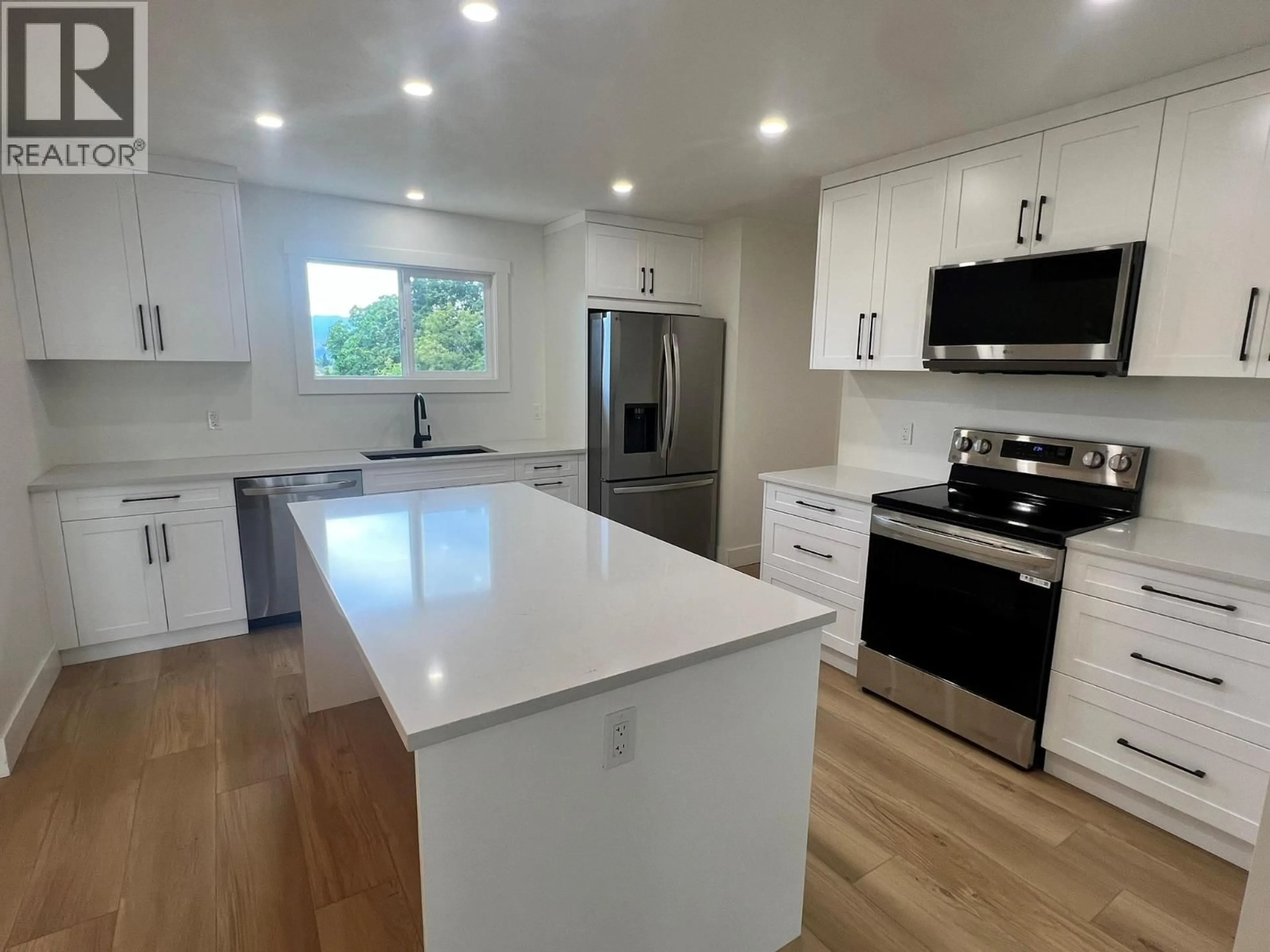 Open concept kitchen, unknown for 1457 ALTA VISTA ROAD, Kelowna British Columbia V1Y6K9