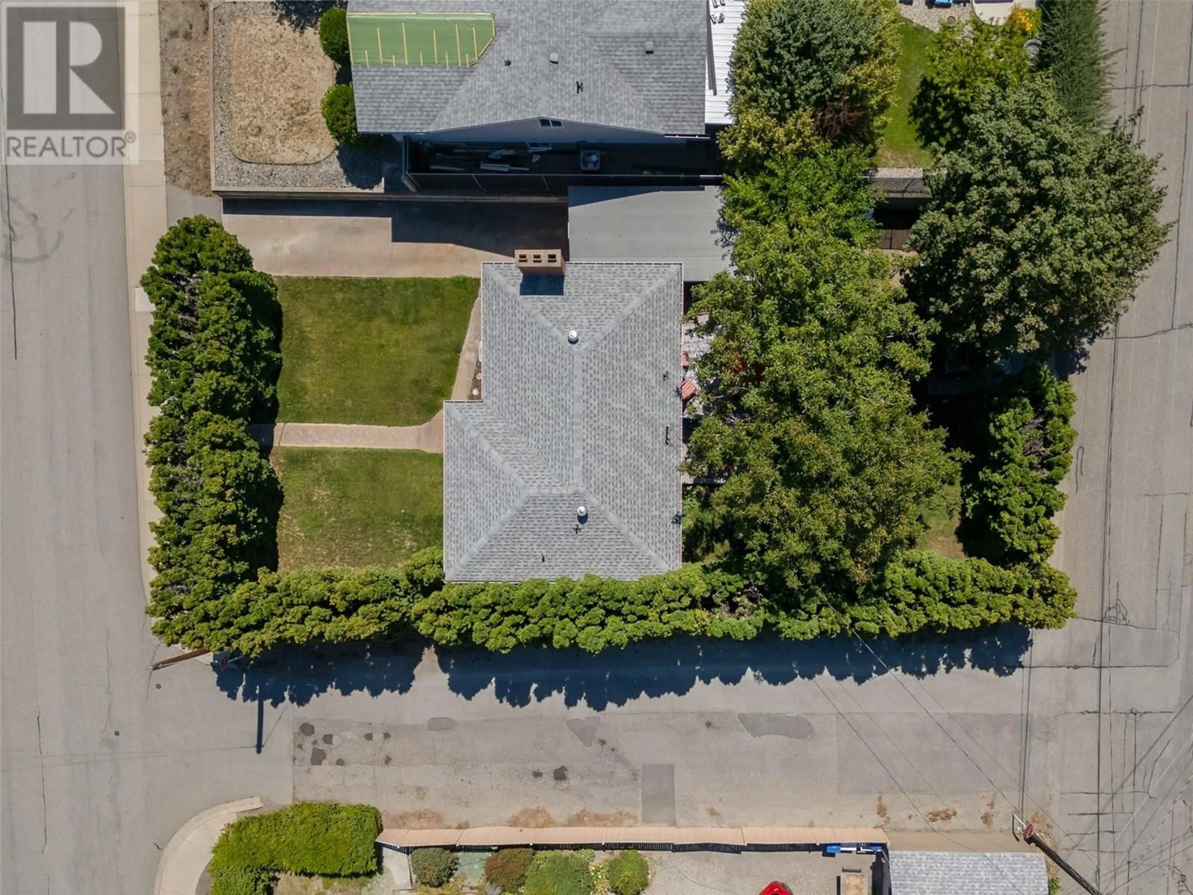 A pic from outside/outdoor area/front of a property/back of a property/a pic from drone, street for 7408 HERON LANE, Osoyoos British Columbia V0H1V5