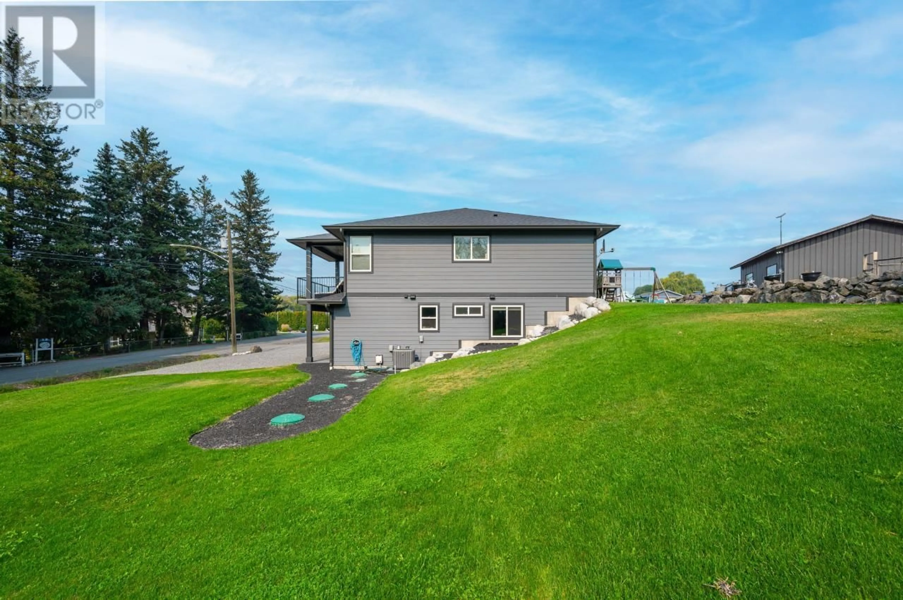 A pic from outside/outdoor area/front of a property/back of a property/a pic from drone, water/lake/river/ocean view for 6920 SAVONA ACCESS ROAD, Kamloops British Columbia V0K2J0