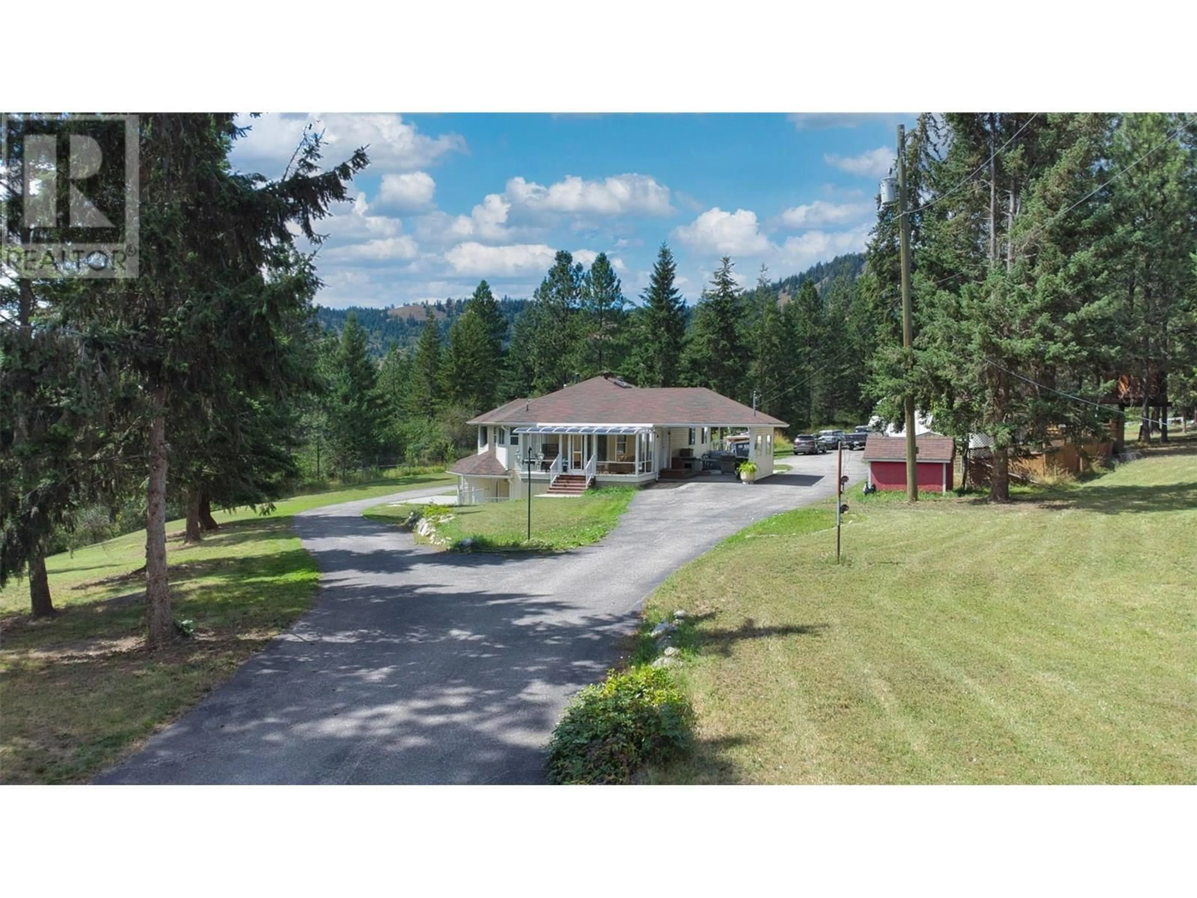 A pic from outside/outdoor area/front of a property/back of a property/a pic from drone, mountain view for 90 MCINNES ROAD, Lumby British Columbia V0E2G1