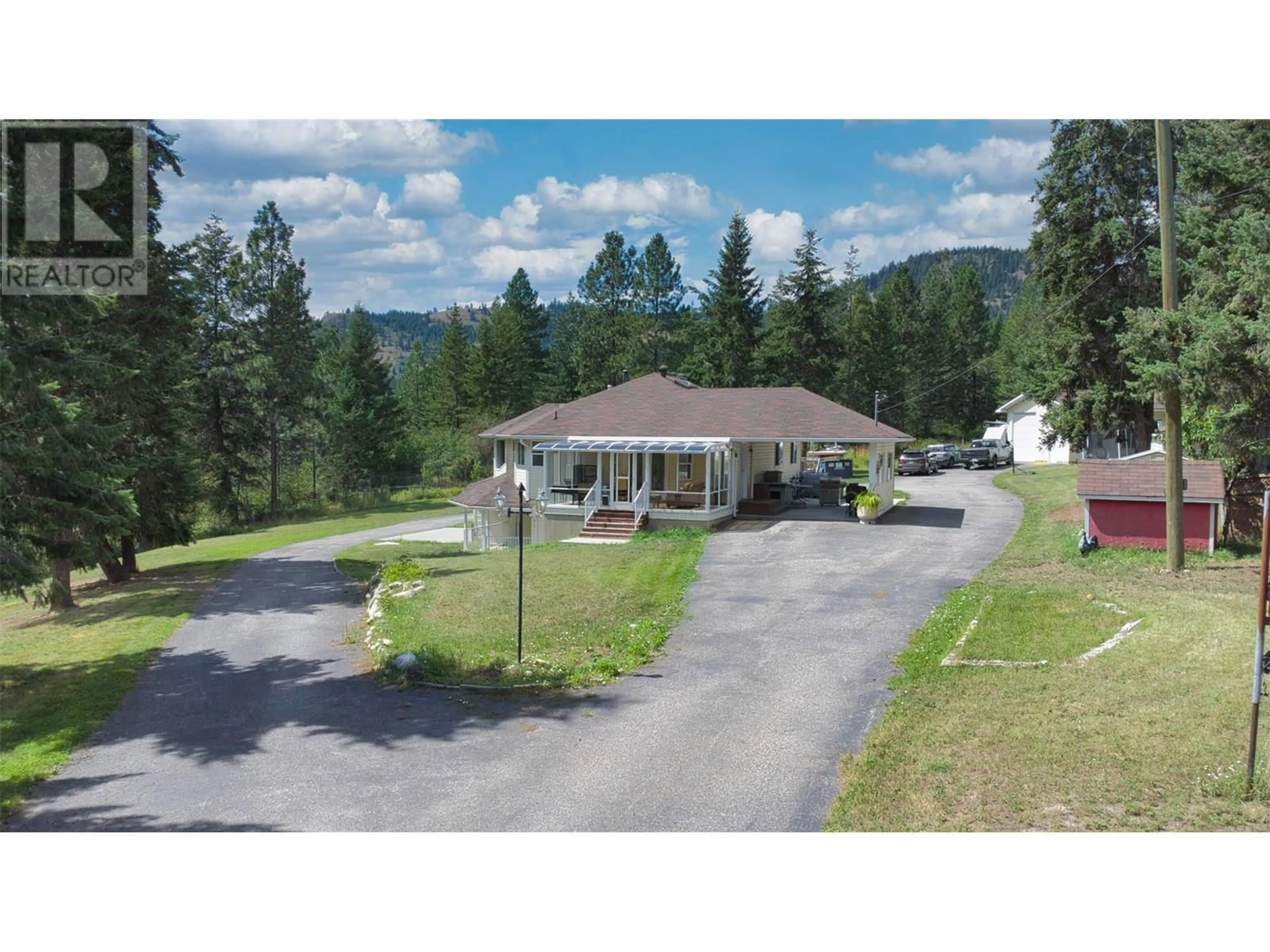 A pic from outside/outdoor area/front of a property/back of a property/a pic from drone, mountain view for 90 MCINNES ROAD, Lumby British Columbia V0E2G1